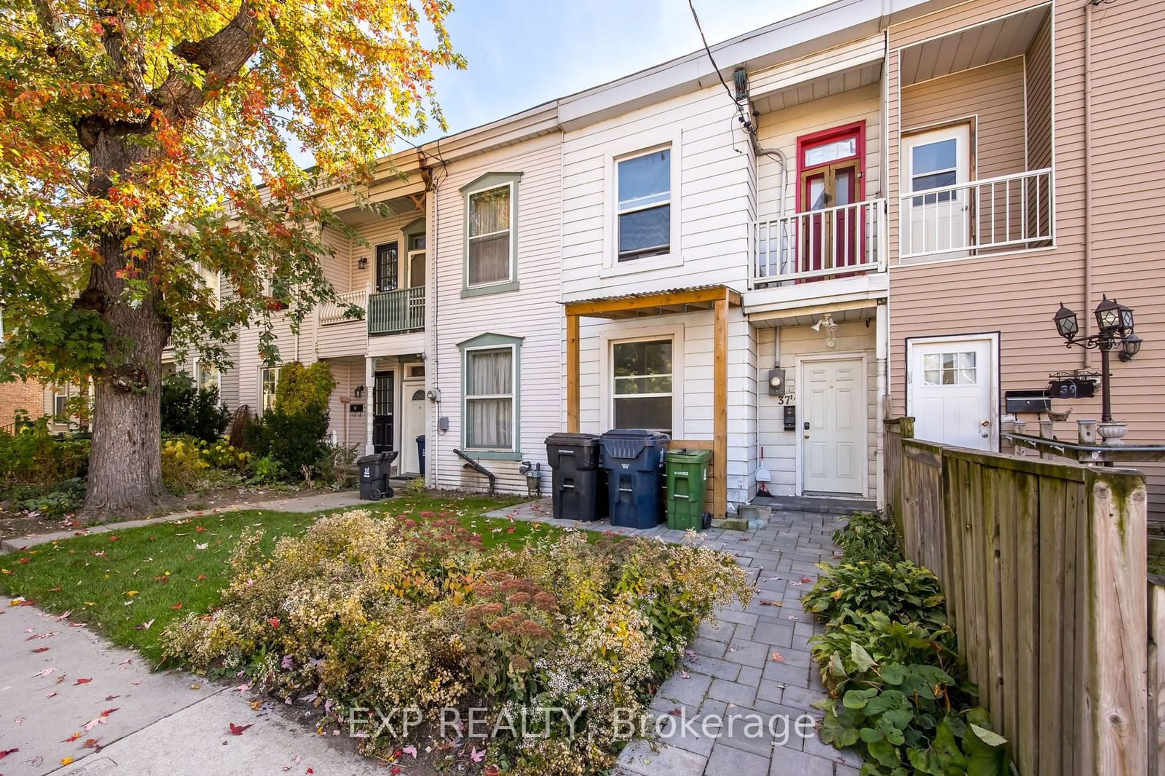 A pic from exterior of the house or condo, the fenced backyard for 37 Vine Ave, Toronto Ontario M6P 1V6