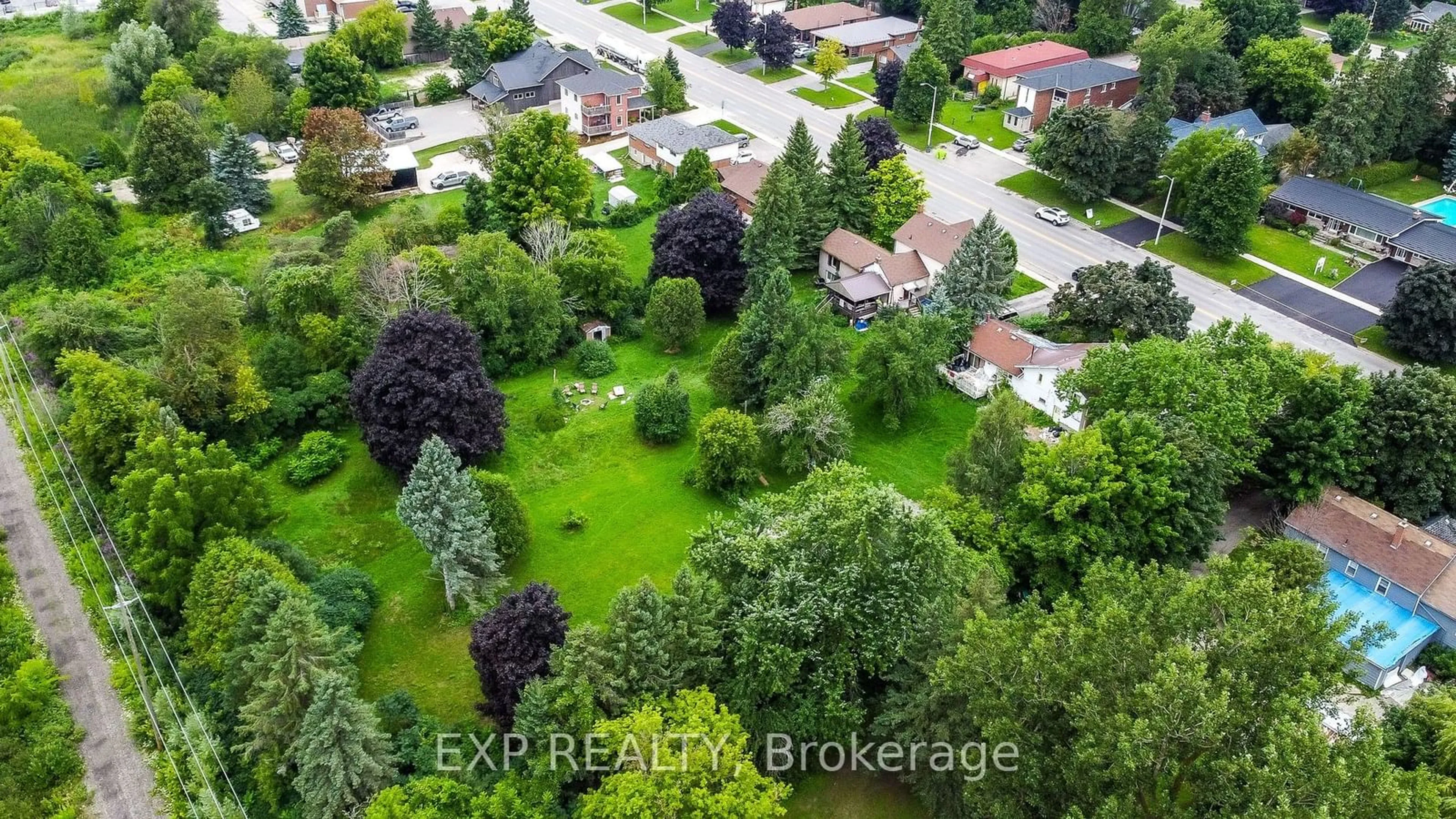 Frontside or backside of a home, the fenced backyard for 292 Broadway, Orangeville Ontario L9W 1L3