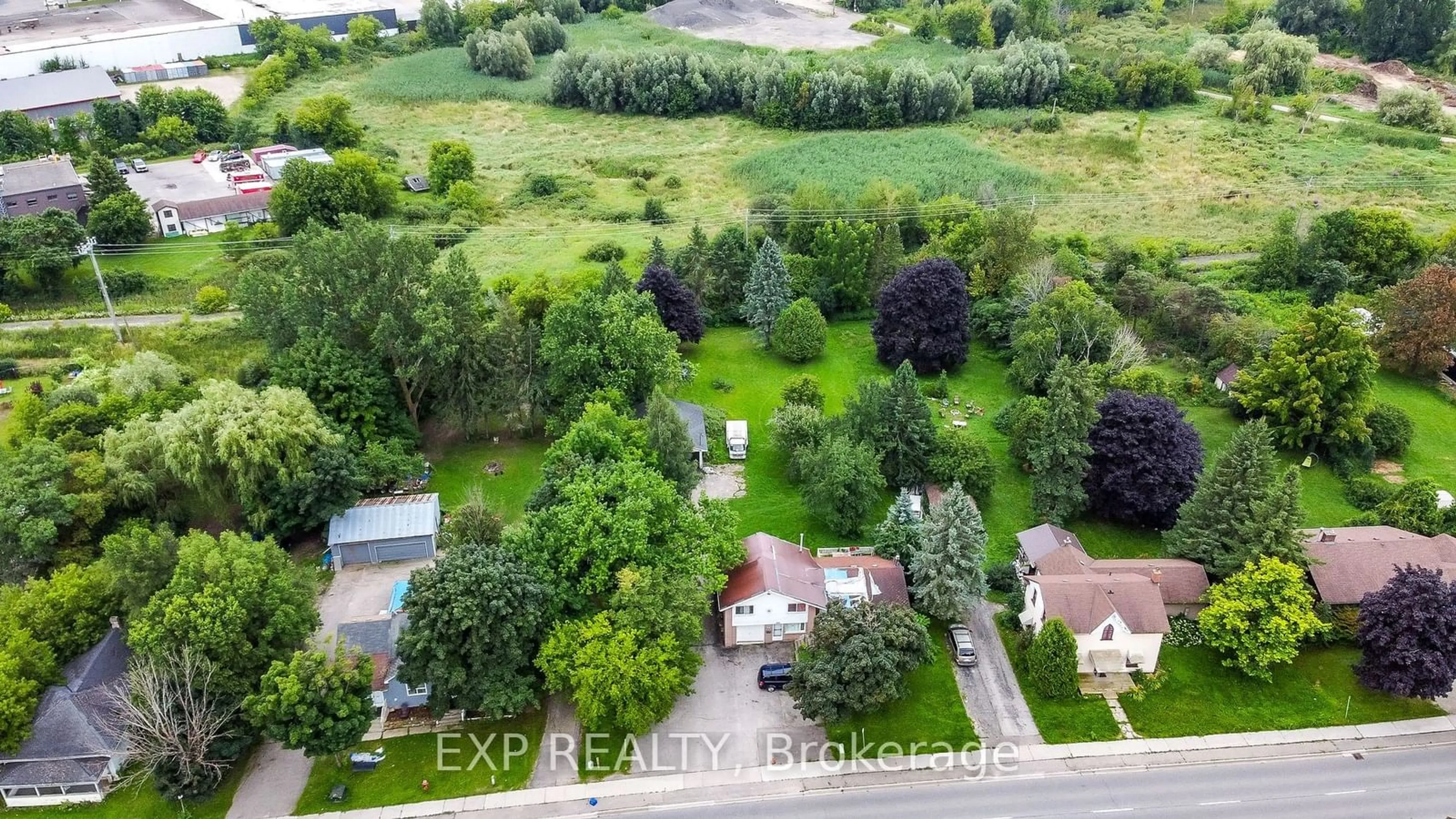 A pic from exterior of the house or condo, the fenced backyard for 294 Broadway, Orangeville Ontario L9W 1L3