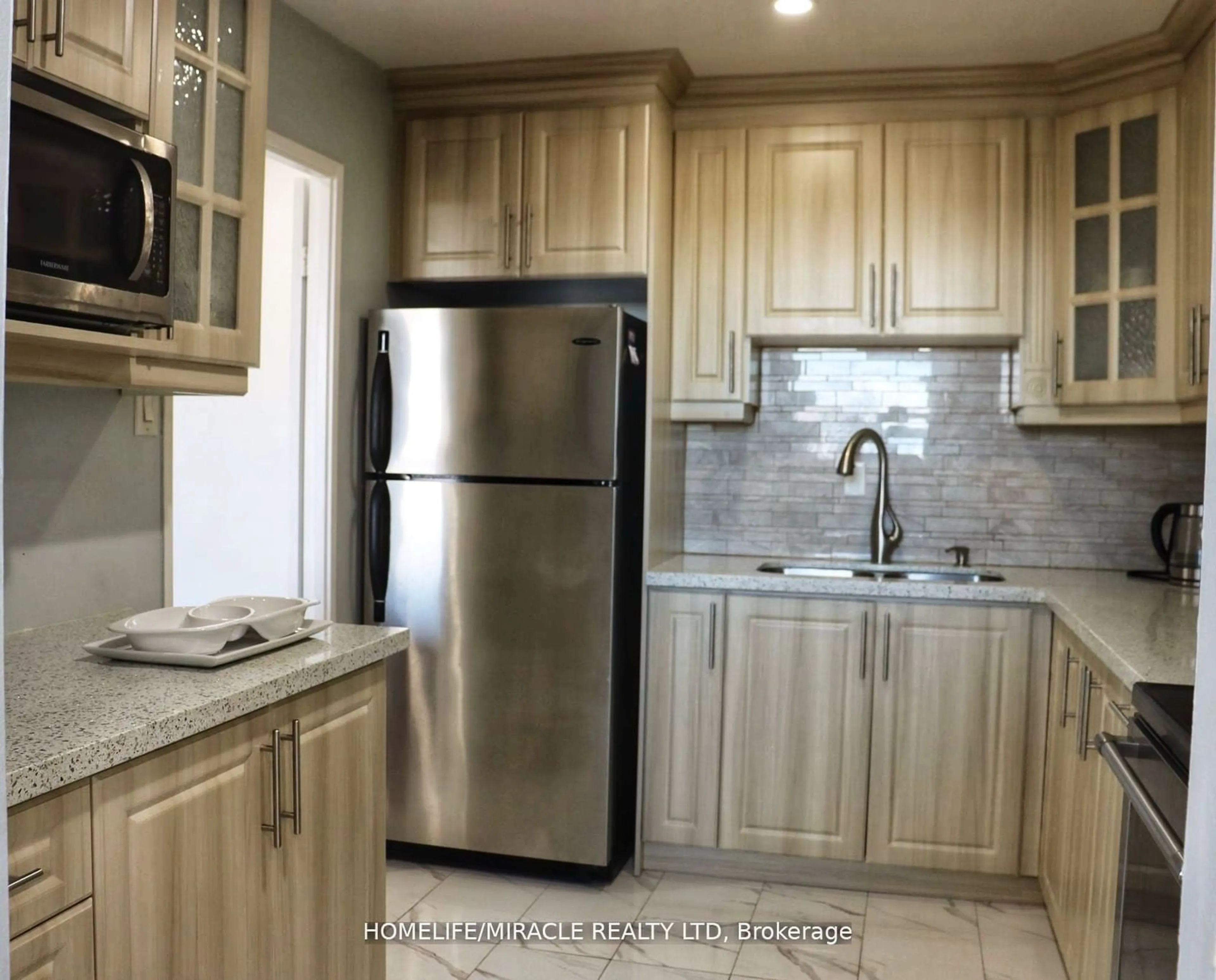 Standard kitchen, ceramic floors, cottage for 3533 Derry Rd #608, Mississauga Ontario L4T 1B1