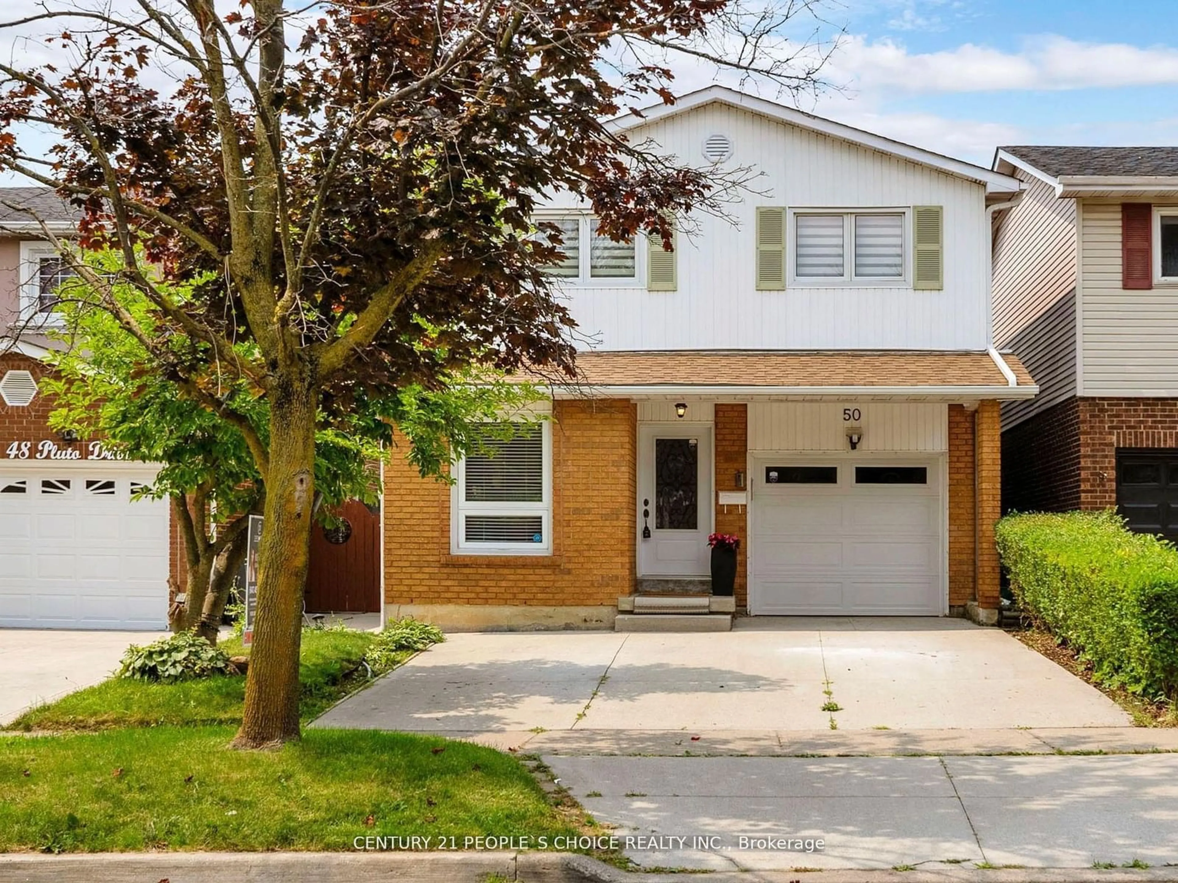 Frontside or backside of a home, the street view for 50 Pluto Dr, Brampton Ontario L6V 3W5