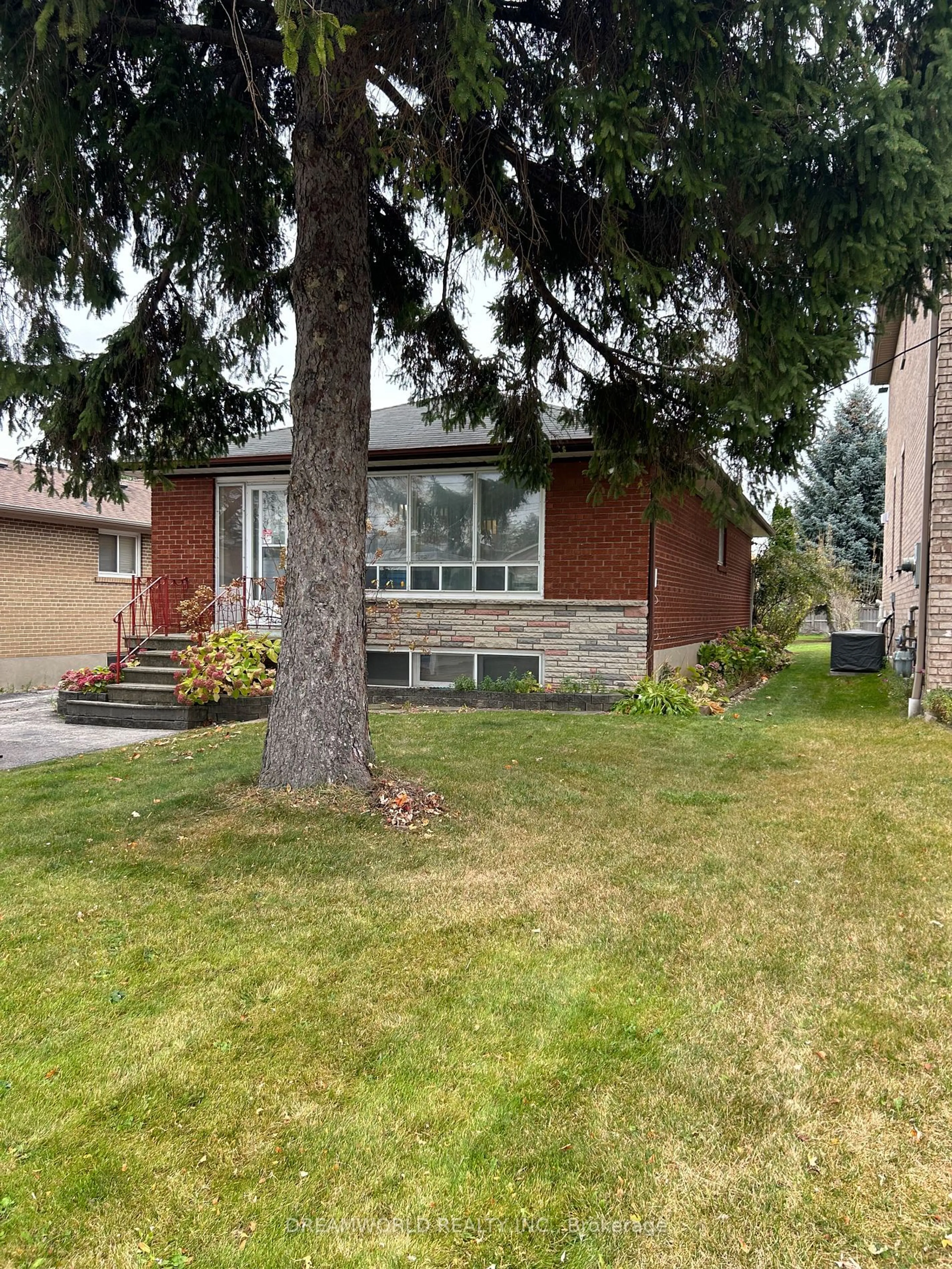 Frontside or backside of a home, the fenced backyard for 95 Gaydon Ave, Toronto Ontario M9M 1G8