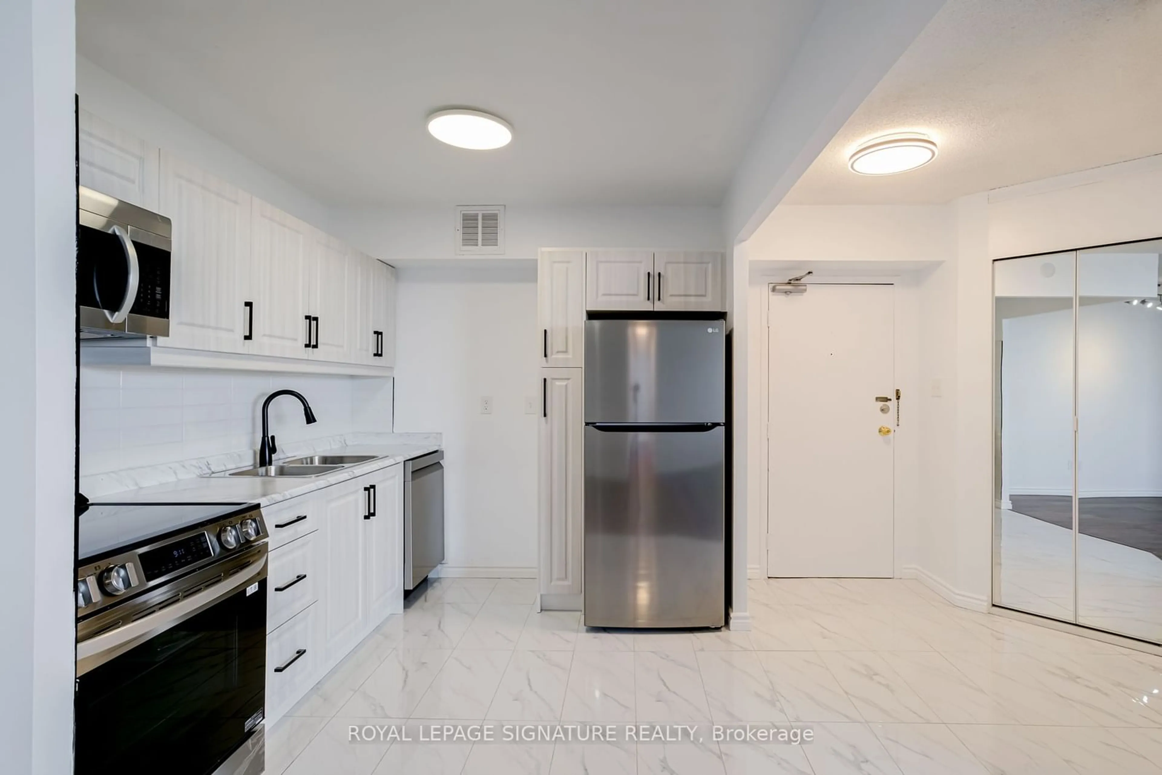 Standard kitchen, ceramic floors for 380 Dixon Rd #2605, Toronto Ontario M9R 1T3