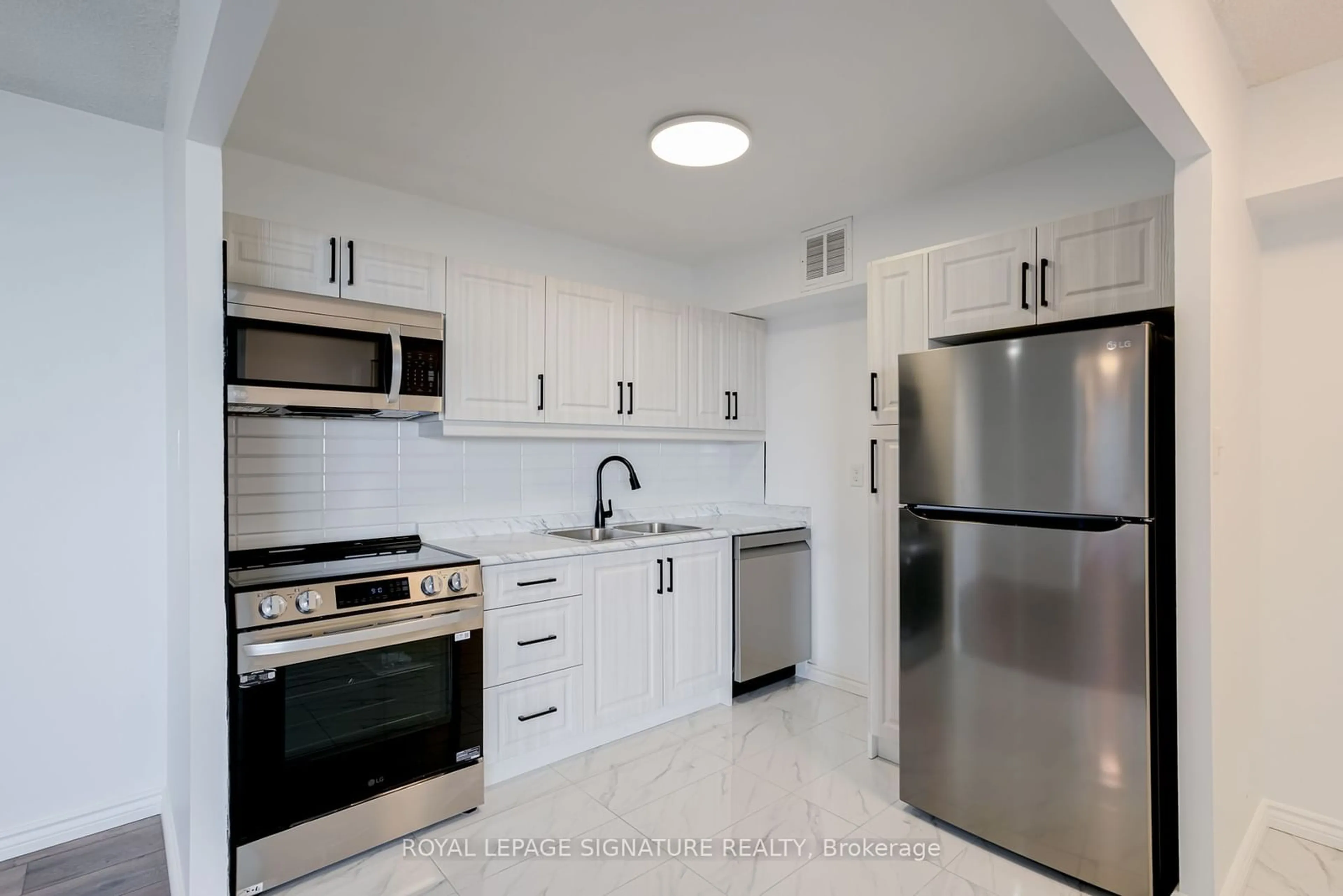 Standard kitchen, ceramic floors, cottage for 380 Dixon Rd #2605, Toronto Ontario M9R 1T3