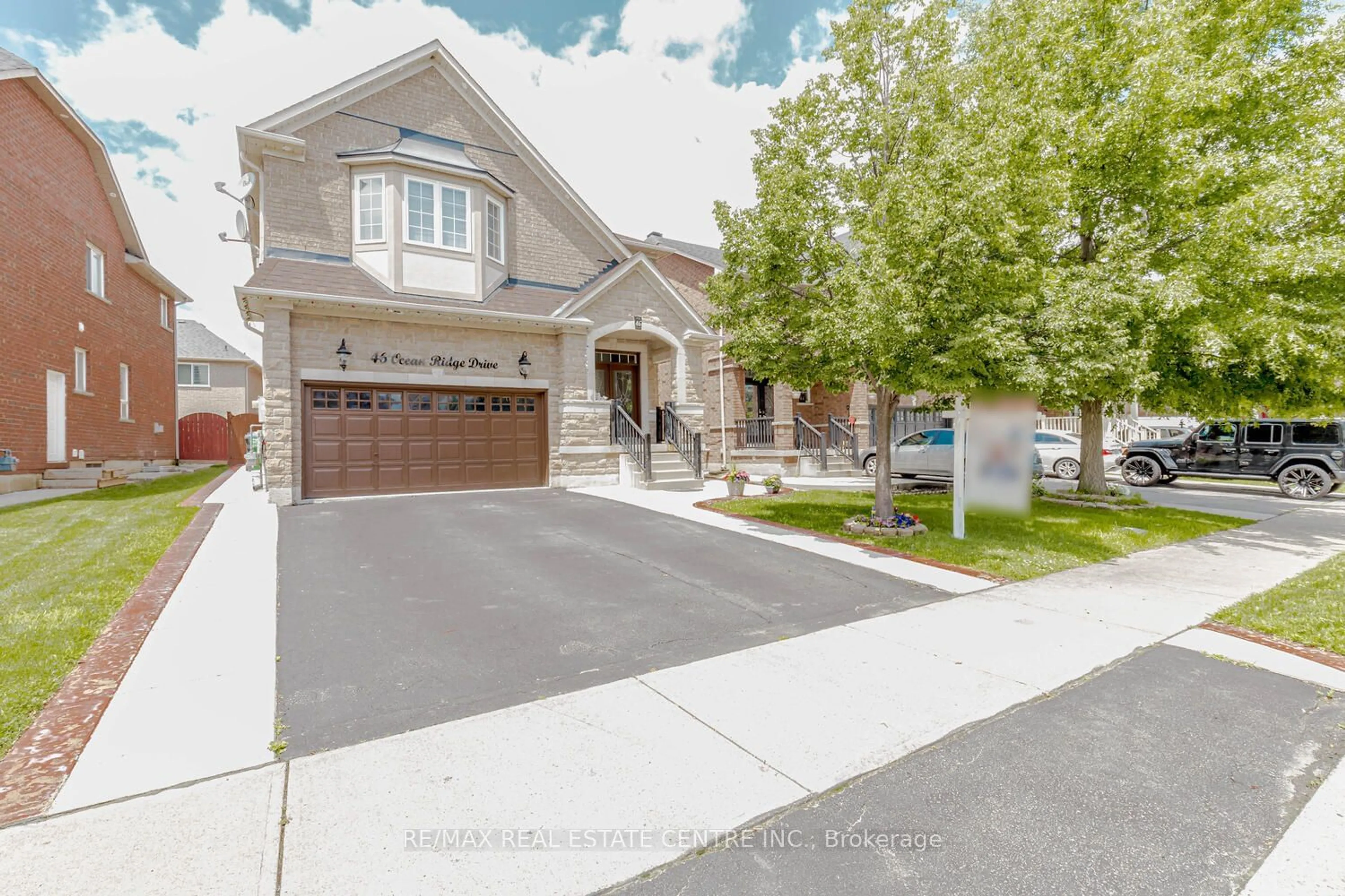 Frontside or backside of a home, the street view for 46 Ocean Ridge Dr, Brampton Ontario L6R 3K5