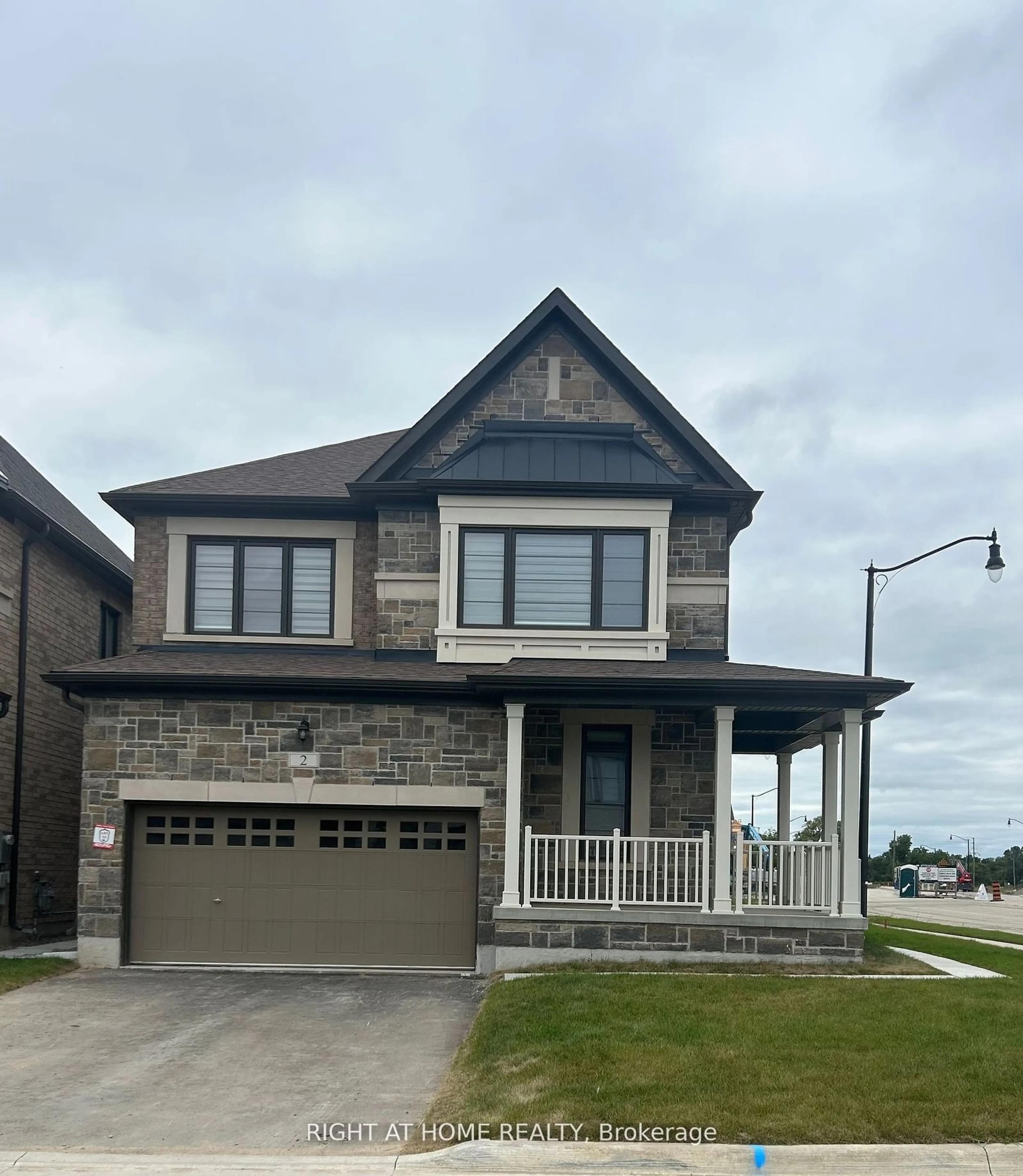 Frontside or backside of a home, the street view for 2 Trellanock Rd, Brampton Ontario L6Y 6K8