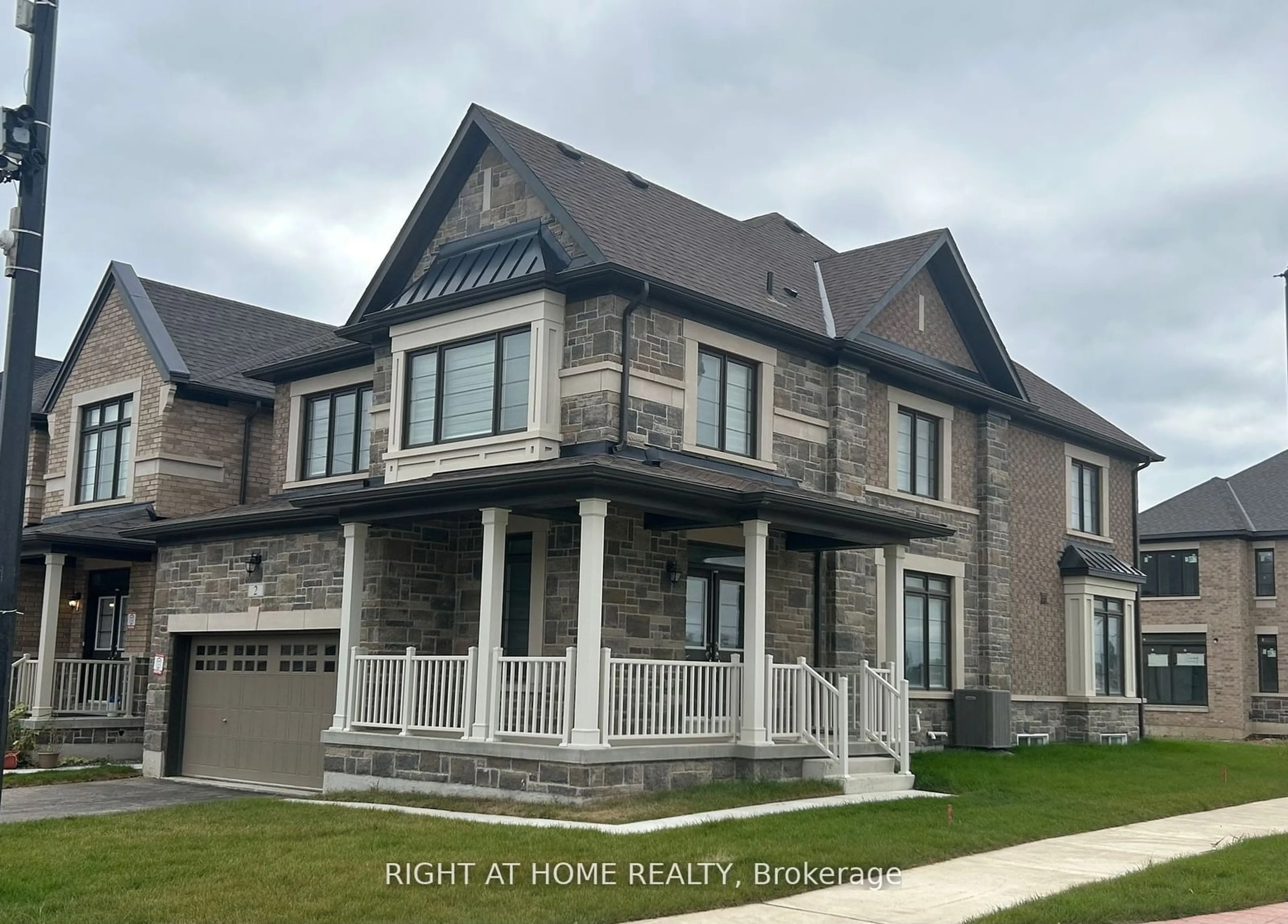 Frontside or backside of a home, the street view for 2 Trellanock Rd, Brampton Ontario L6Y 6K8