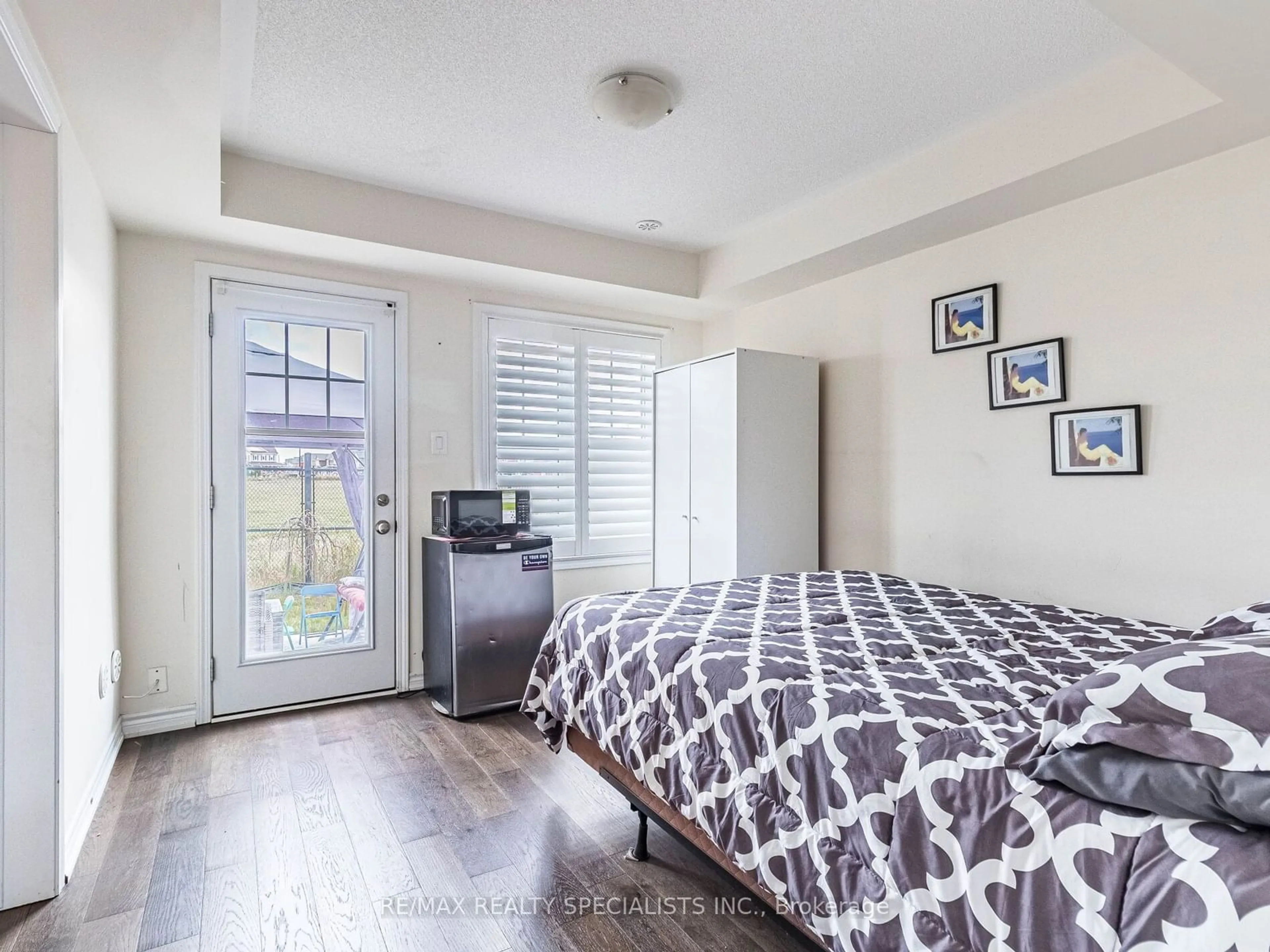 A pic of a room, wood floors for 98 Bannister Cres, Brampton Ontario L7A 4H4