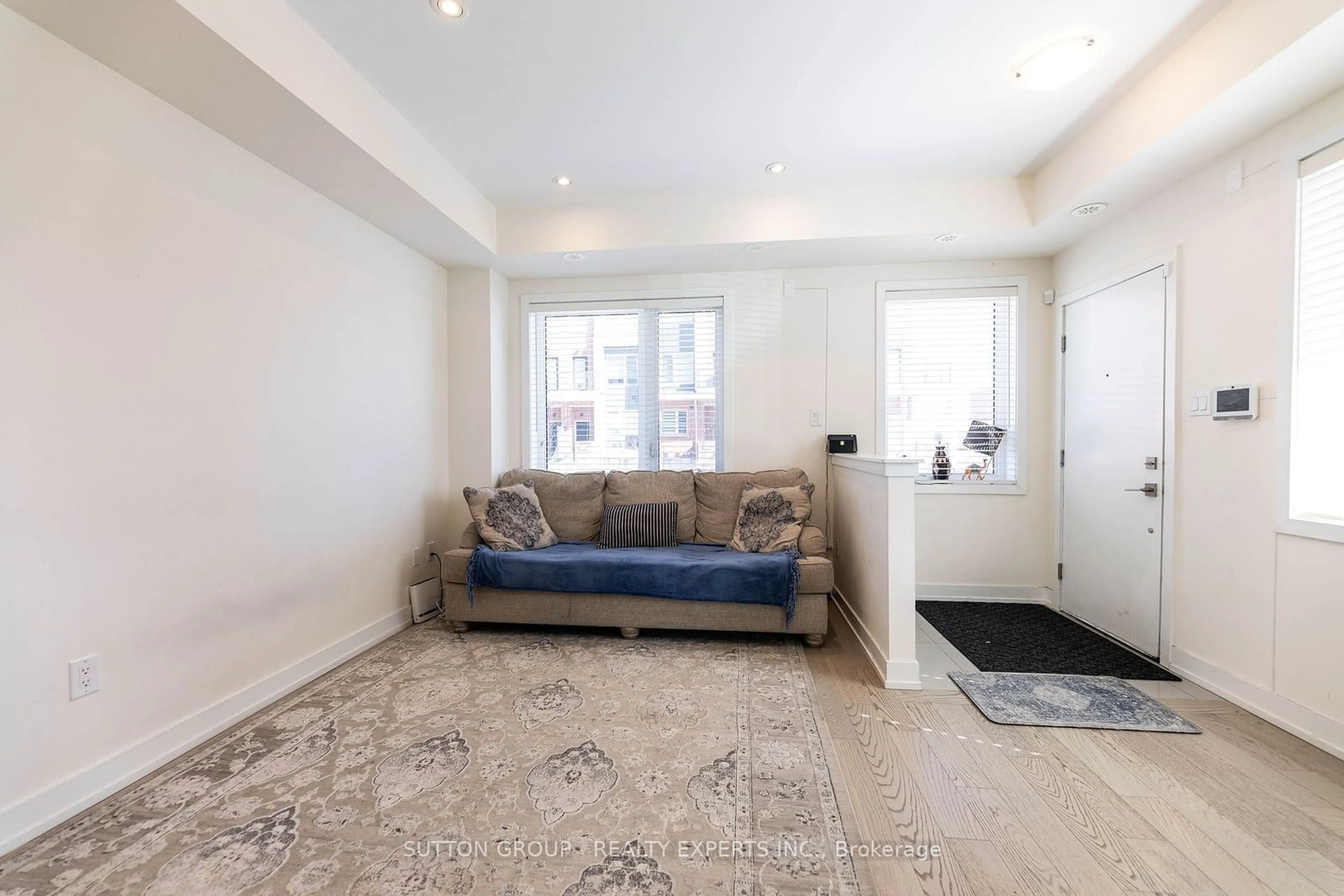 Living room, carpet floors for 82 William Duncan Rd, Toronto Ontario M3K 0B7