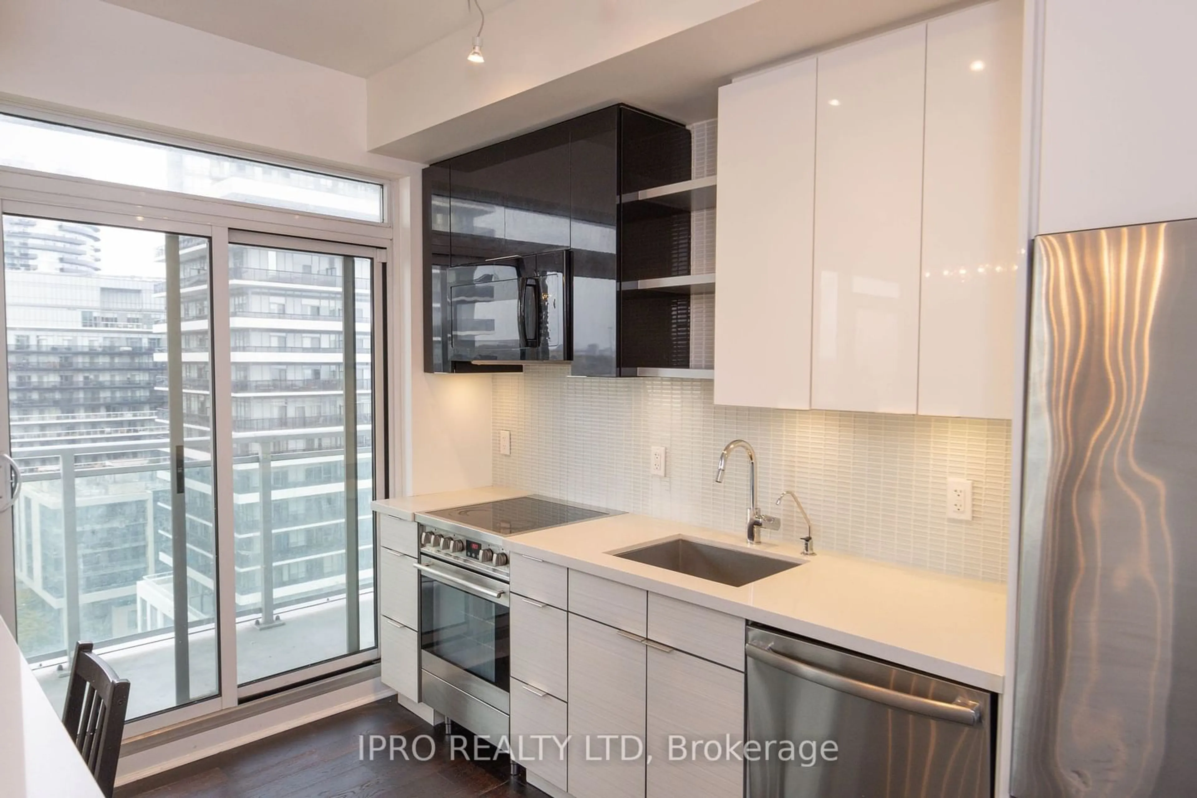 Contemporary kitchen, wood floors for 33 Shore Breeze Dr #1208, Toronto Ontario M8V 0G1