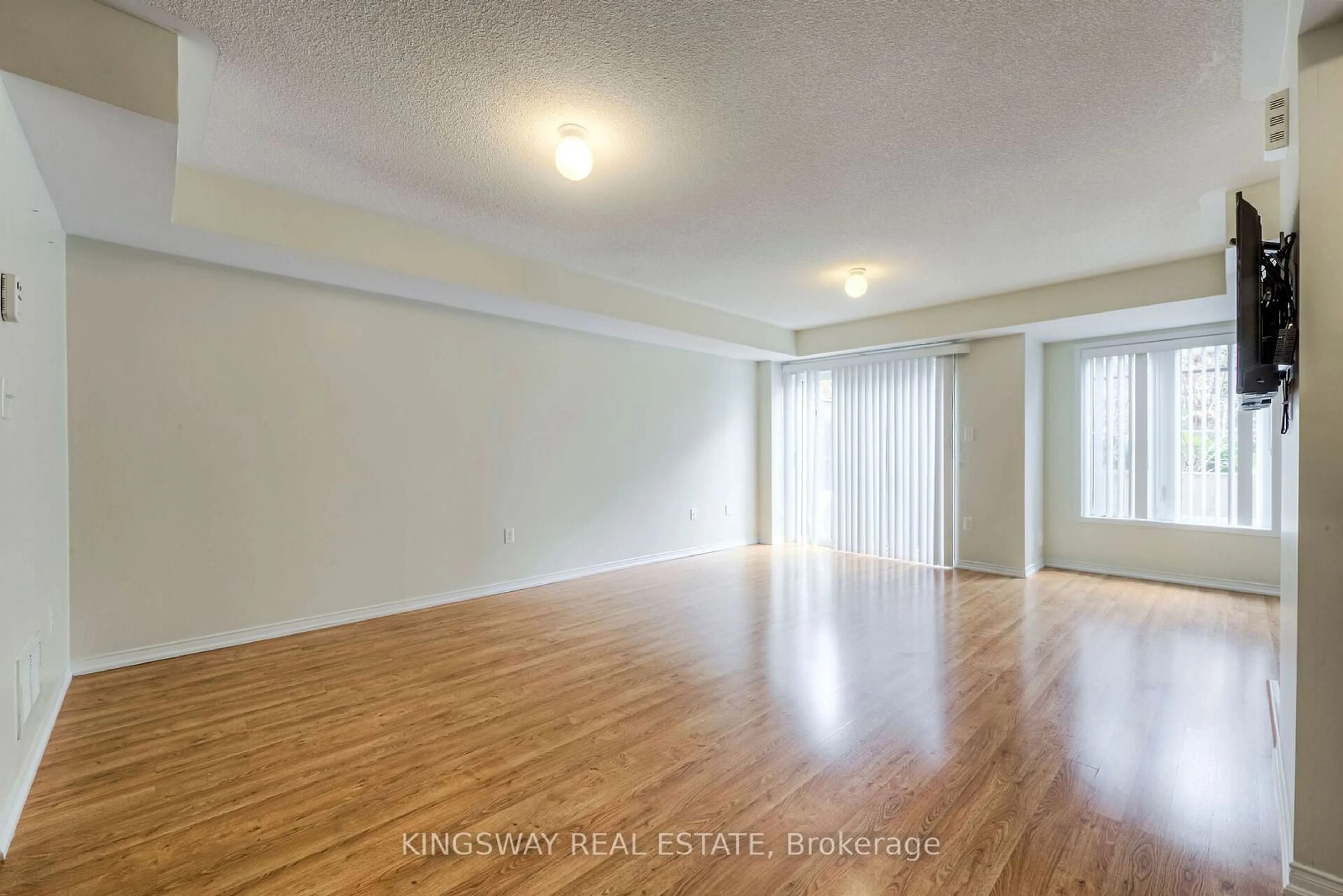 A pic of a room, wood floors for 2488 Post Rd #21, Oakville Ontario L6H 0K1