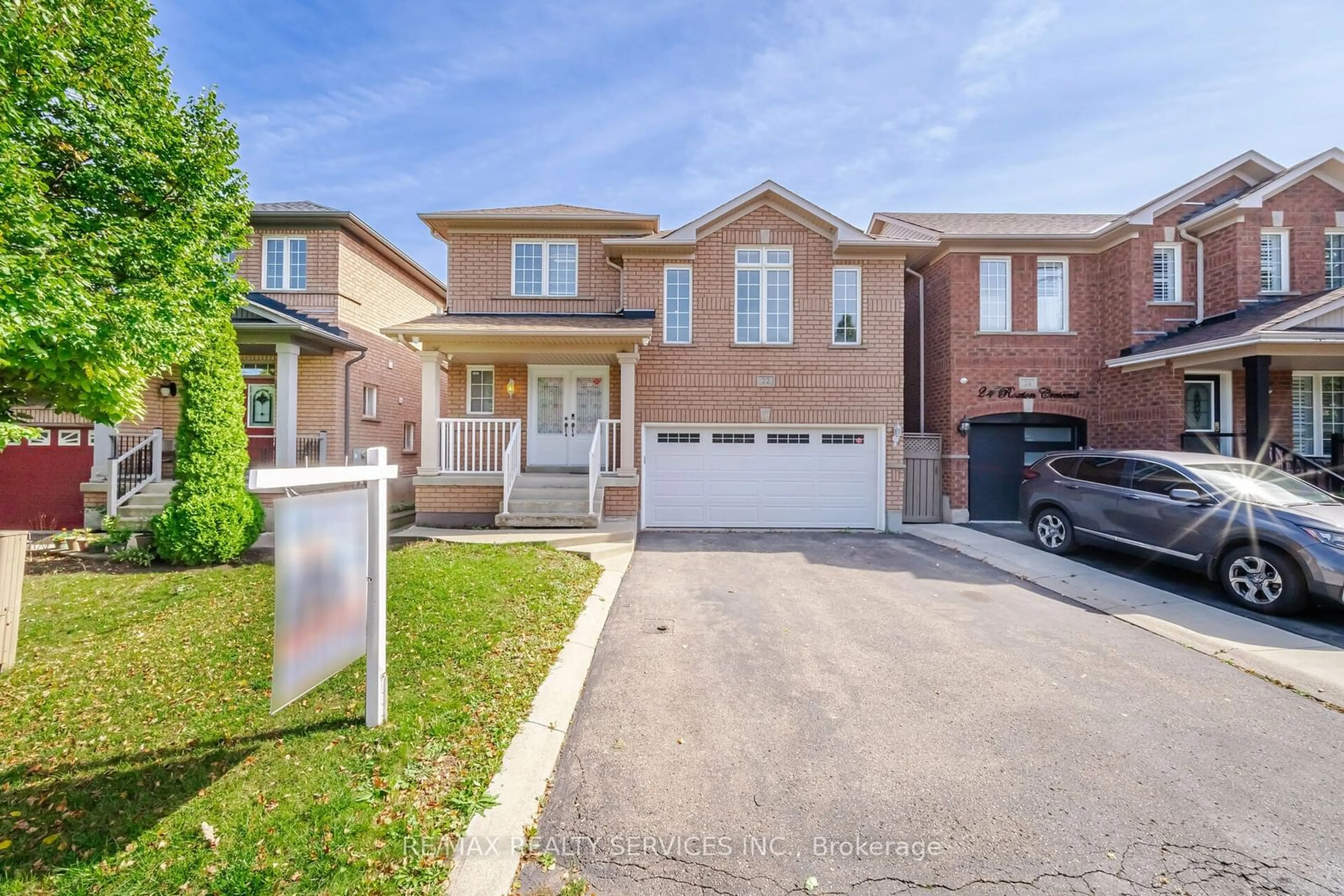 Frontside or backside of a home, the street view for 22 Roxton Cres, Brampton Ontario L7A 2E7