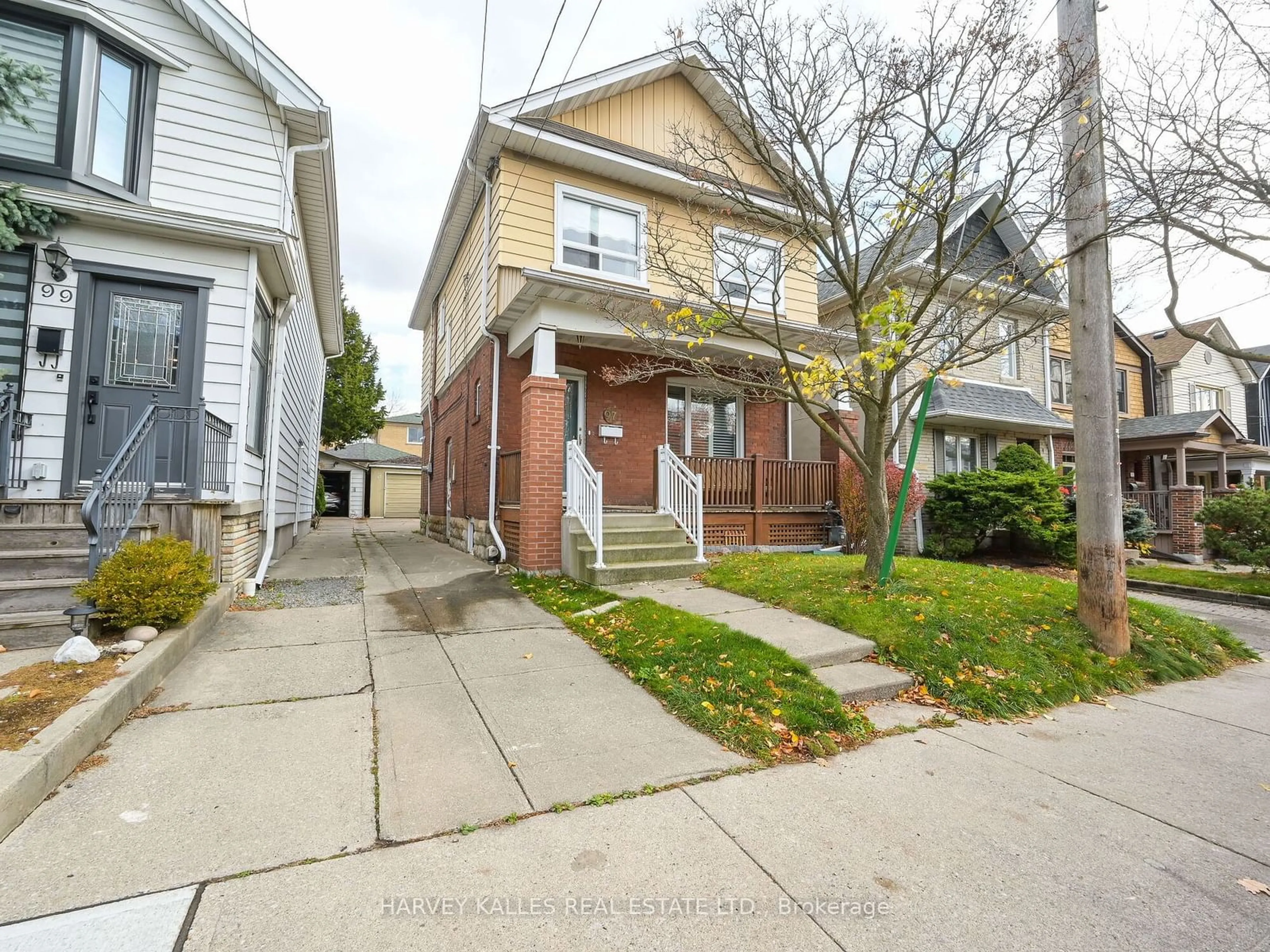 Frontside or backside of a home, the street view for 97 Durie St, Toronto Ontario M6S 3E7