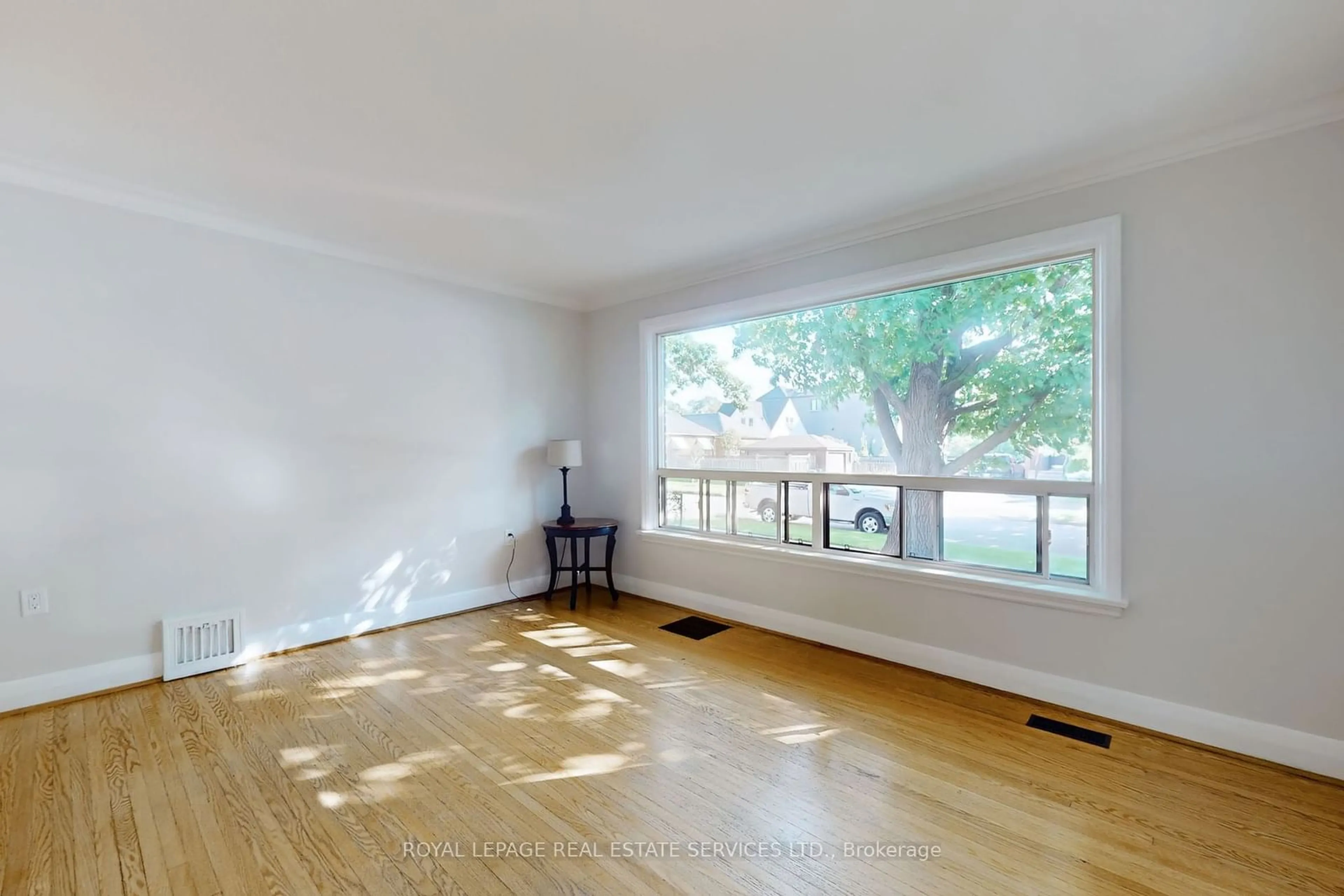 A pic of a room, wood floors for 174 Alderbrae Ave, Toronto Ontario M8W 4K3