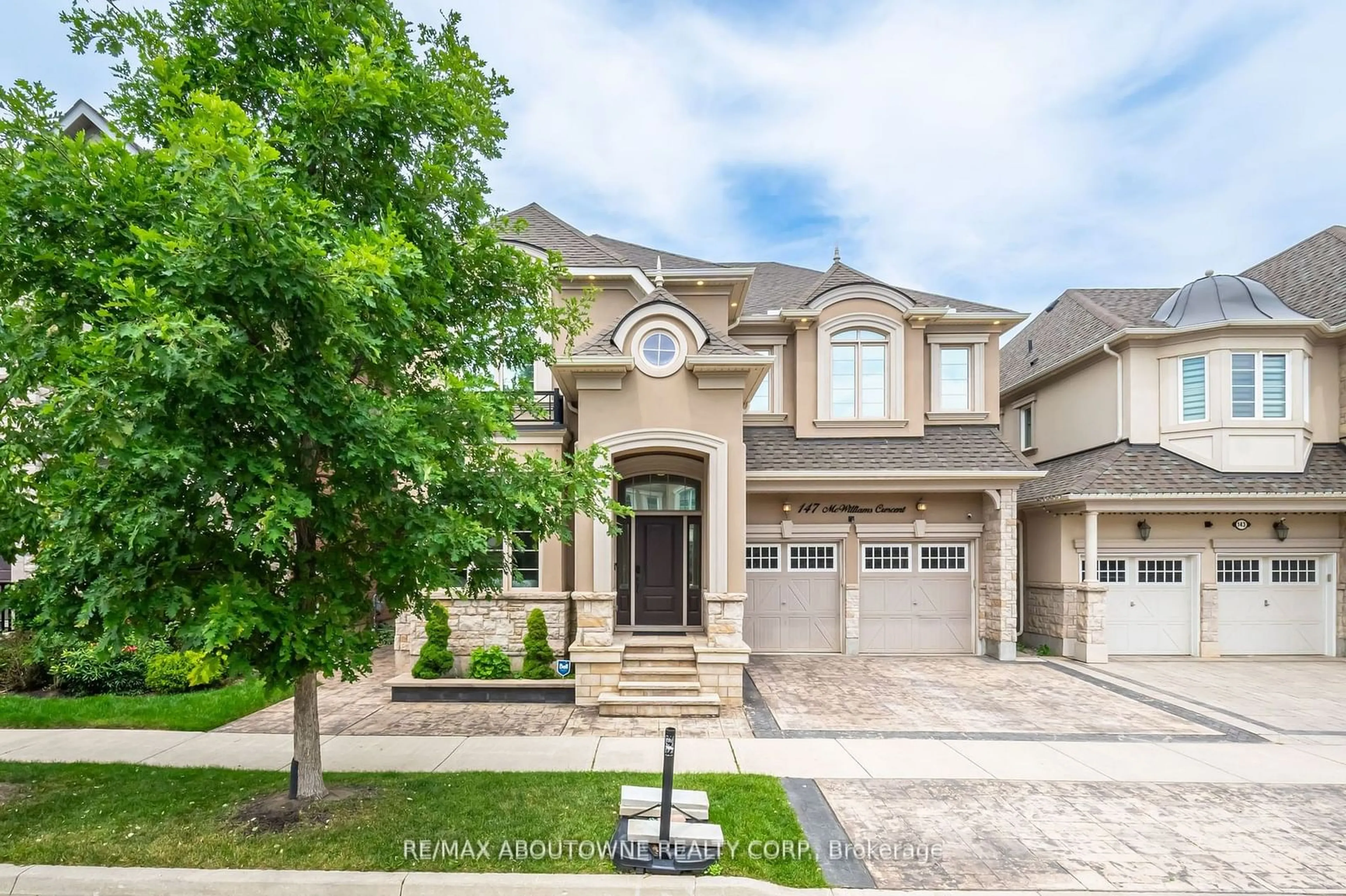 Frontside or backside of a home, the street view for 147 Mcwilliams Cres, Oakville Ontario L6M 0W5