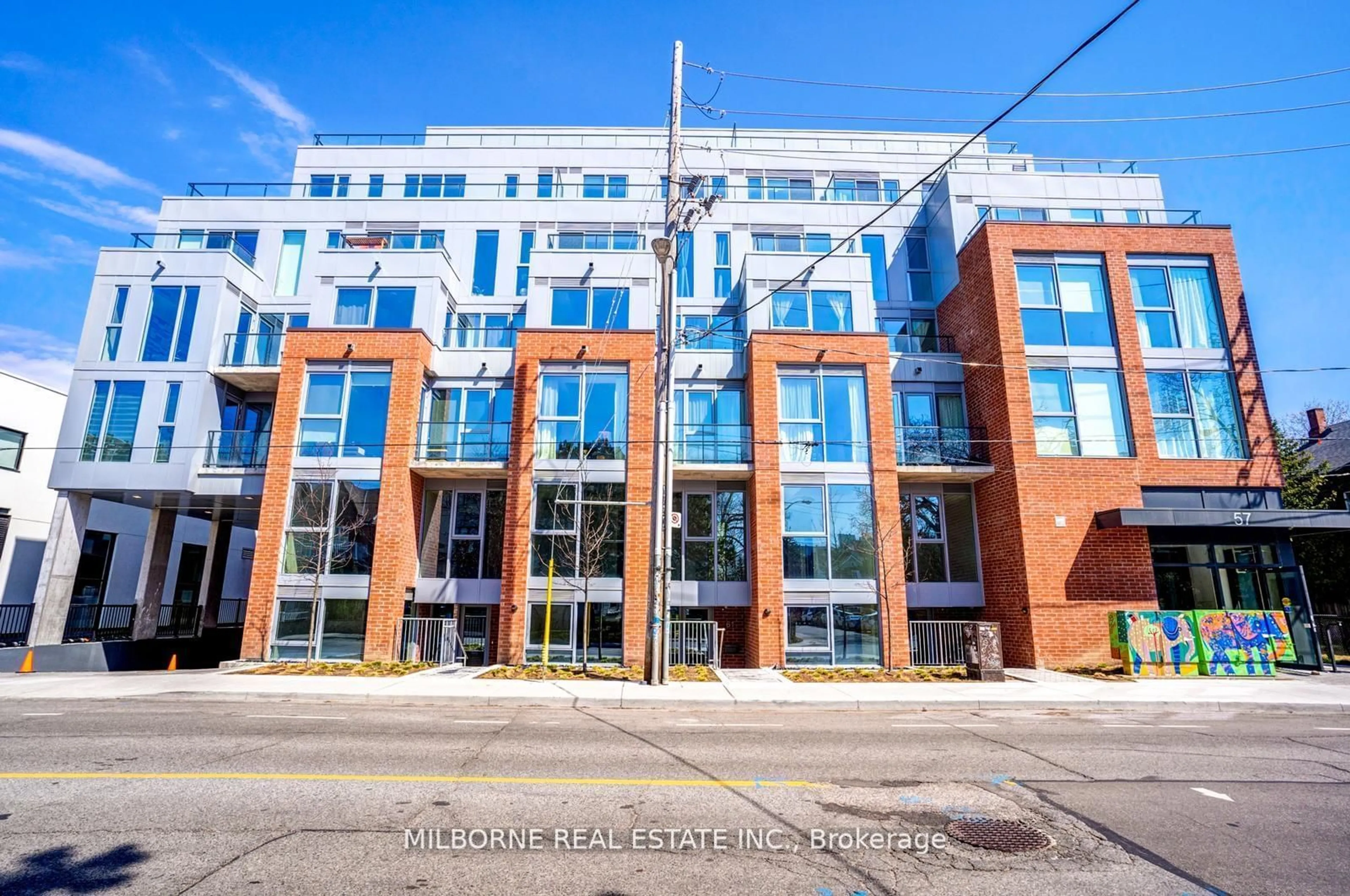 A pic from exterior of the house or condo, the front or back of building for 57 Brock Ave #306, Toronto Ontario M3H 3N2