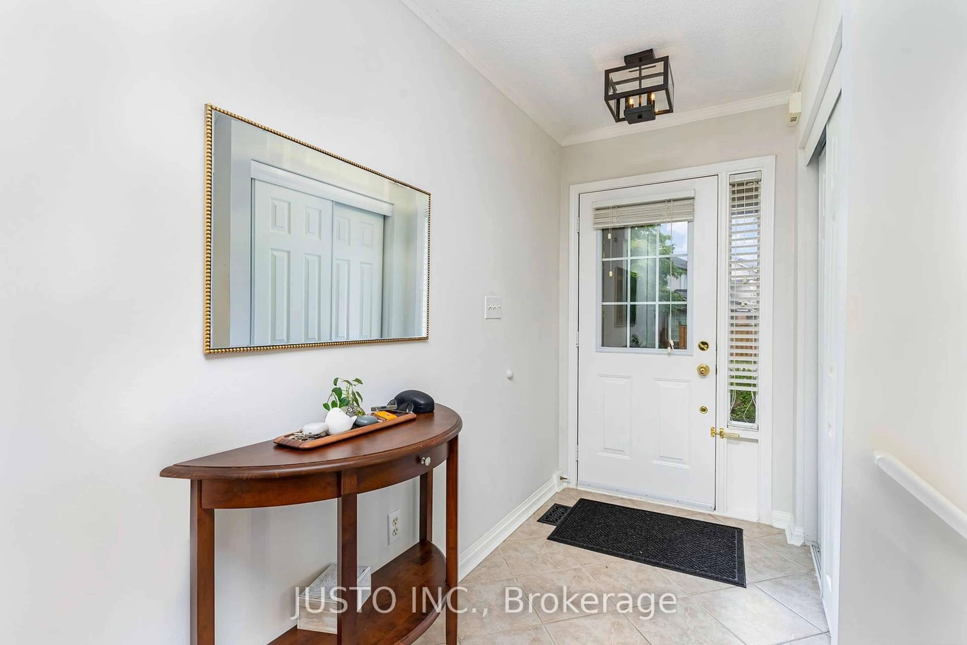 Indoor entryway, wood floors for 2225 Amberglen Crt, Oakville Ontario L6M 4W8