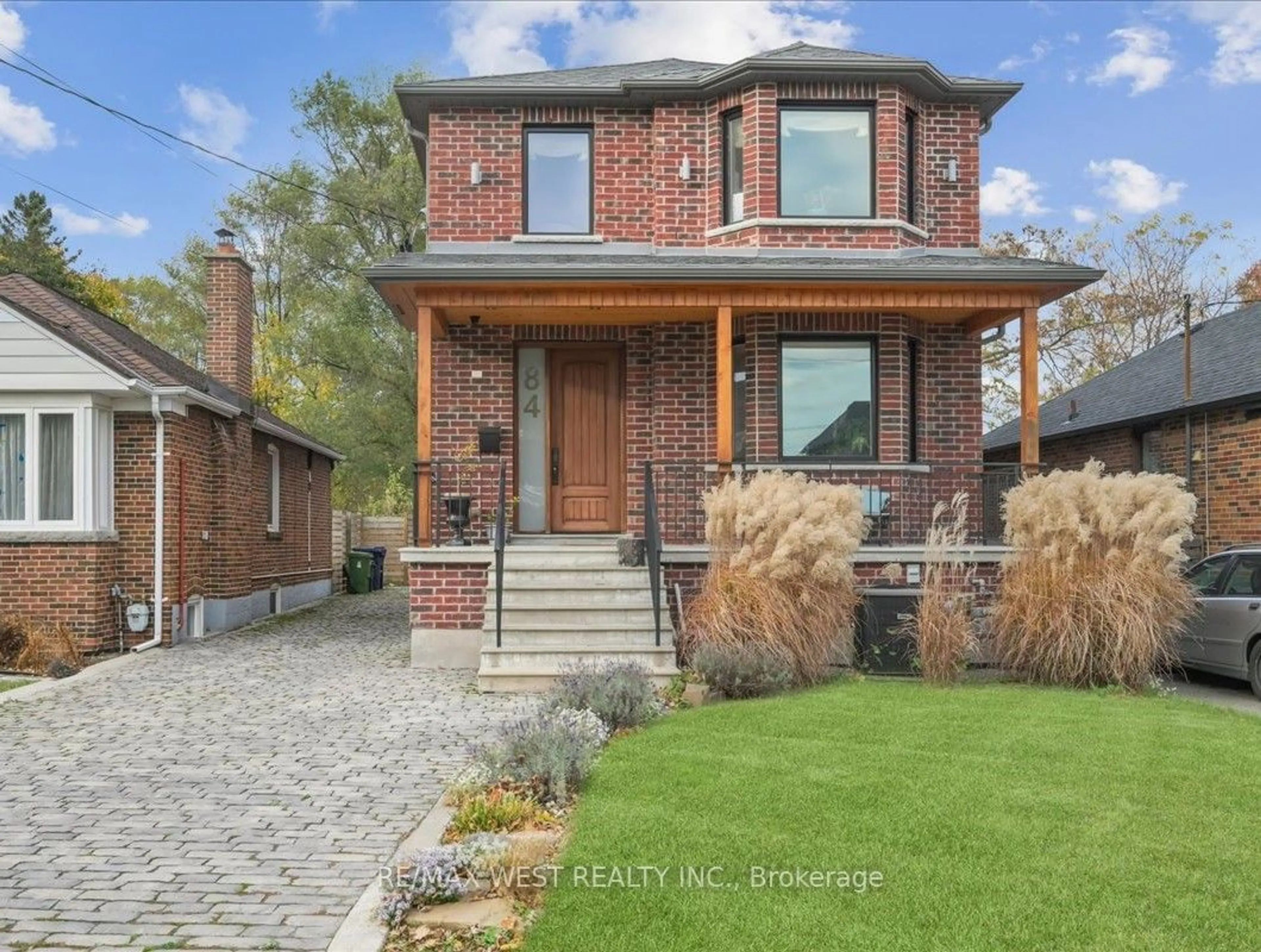 Home with brick exterior material for 84 Ellins Ave, Toronto Ontario M6N 2B1