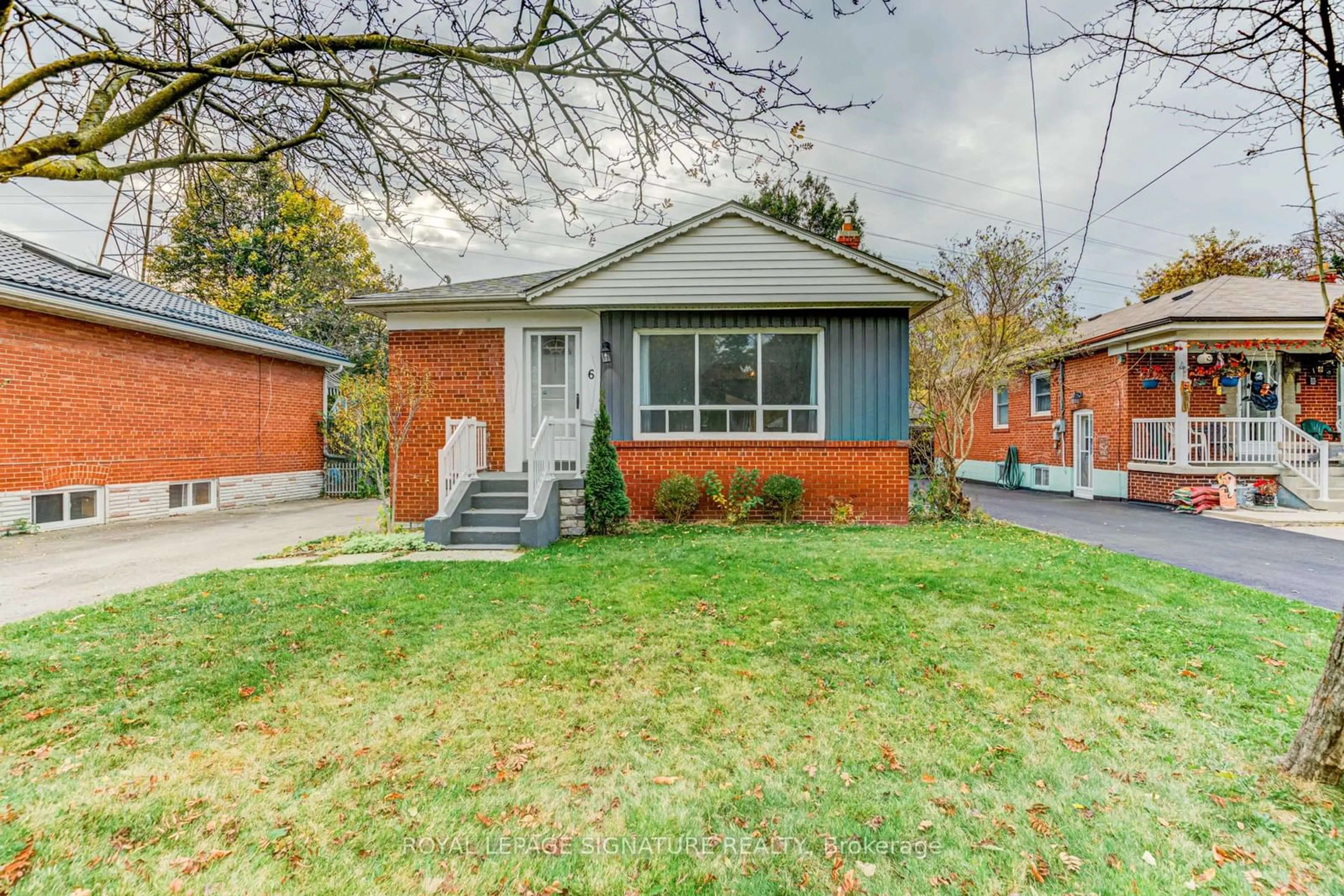 Frontside or backside of a home, the street view for 6 Bonnyview Dr, Toronto Ontario M8Y 3G6