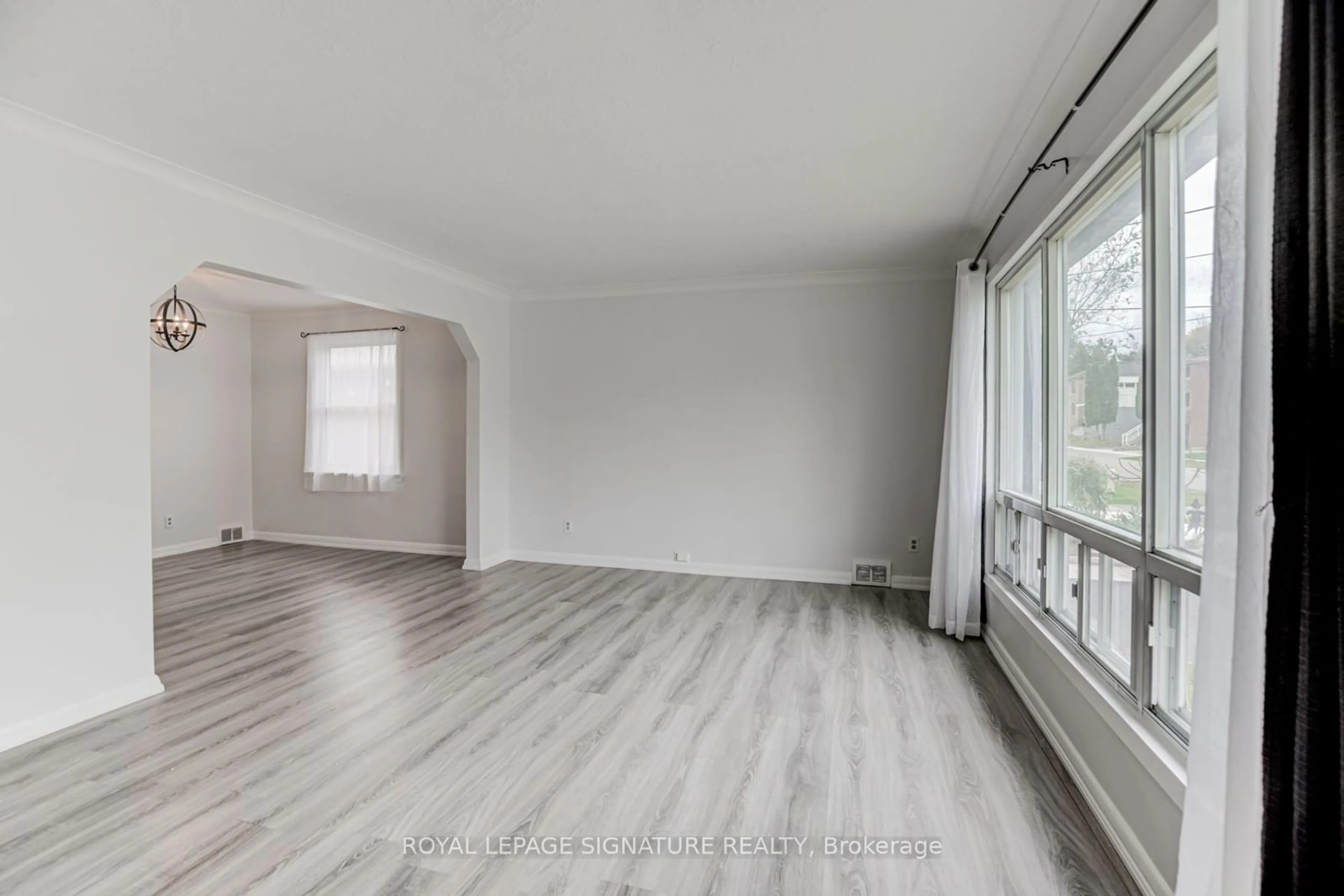 A pic of a room, wood floors for 6 Bonnyview Dr, Toronto Ontario M8Y 3G6