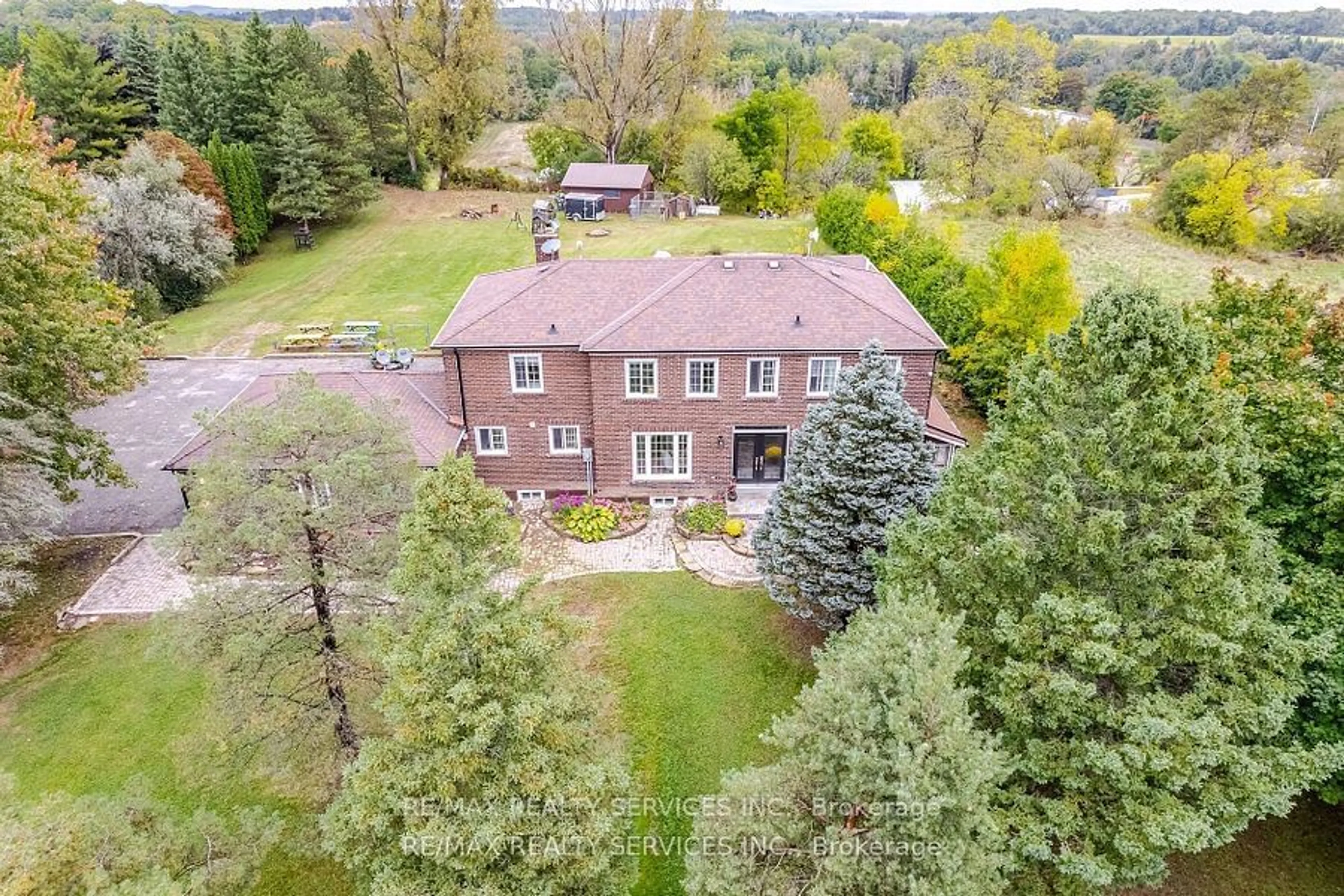 A pic from exterior of the house or condo, the fenced backyard for 15075 Humberstation Rd, Caledon Ontario L7E 3A2