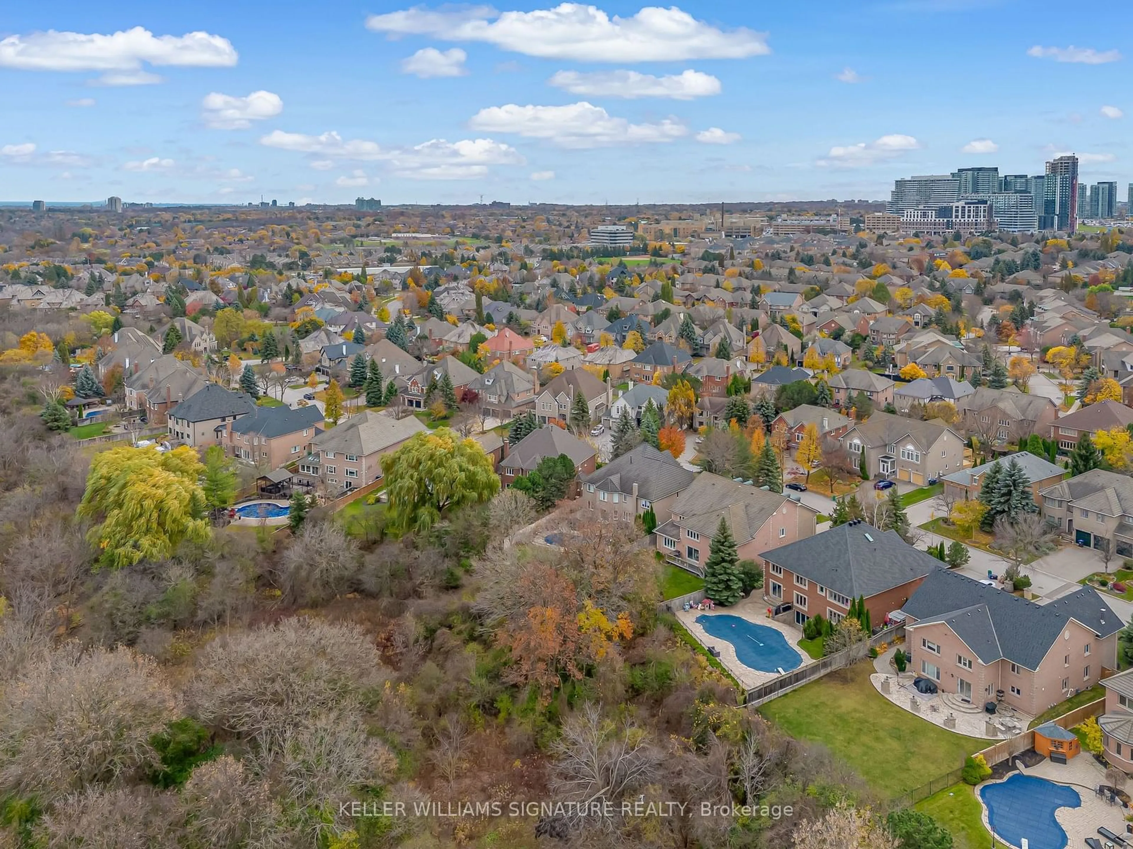 A pic from exterior of the house or condo, the fenced backyard for 5179 Elmridge Dr, Mississauga Ontario L5M 5A4