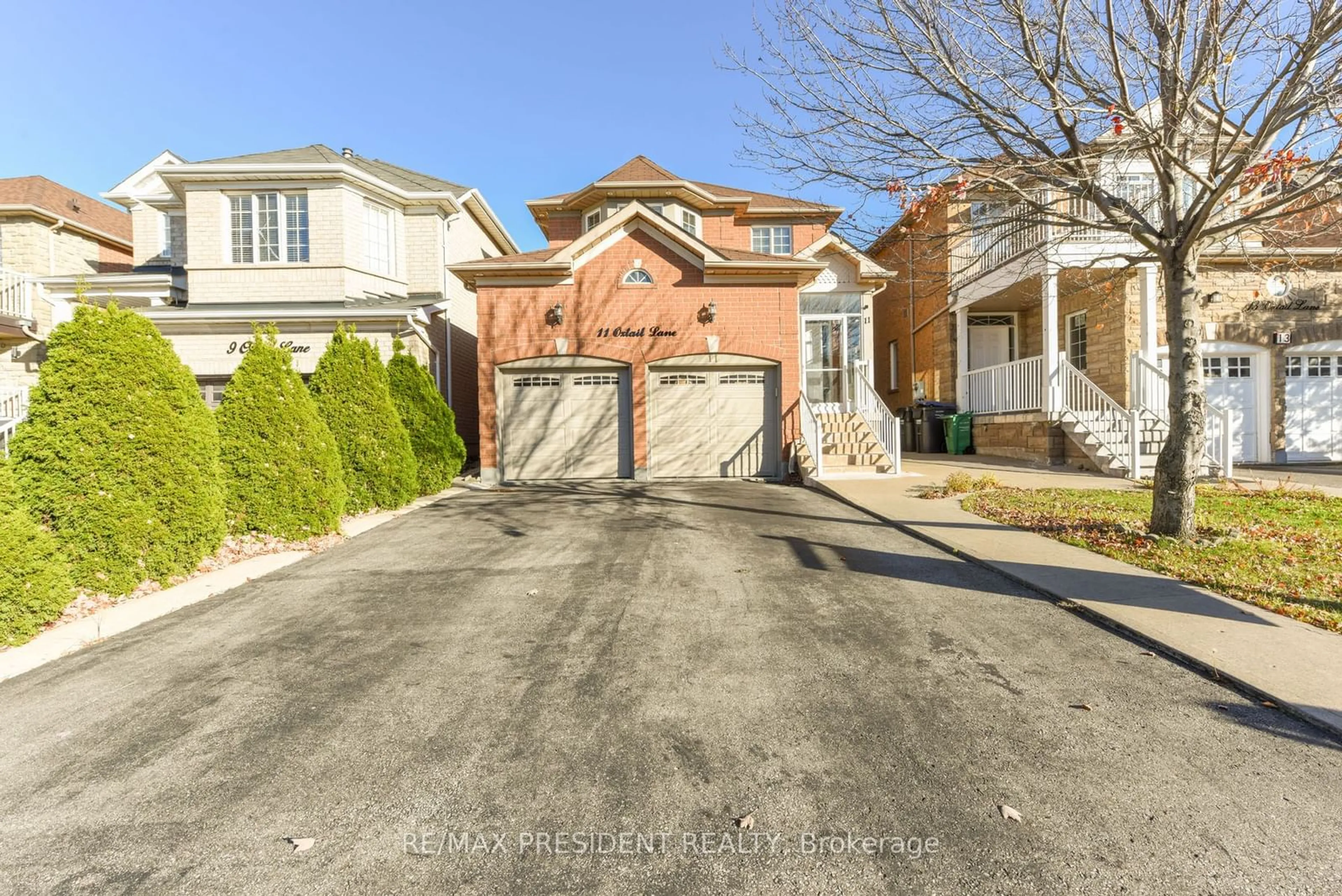 Frontside or backside of a home, the street view for 11 Oxtail Lane, Brampton Ontario L6X 5E2