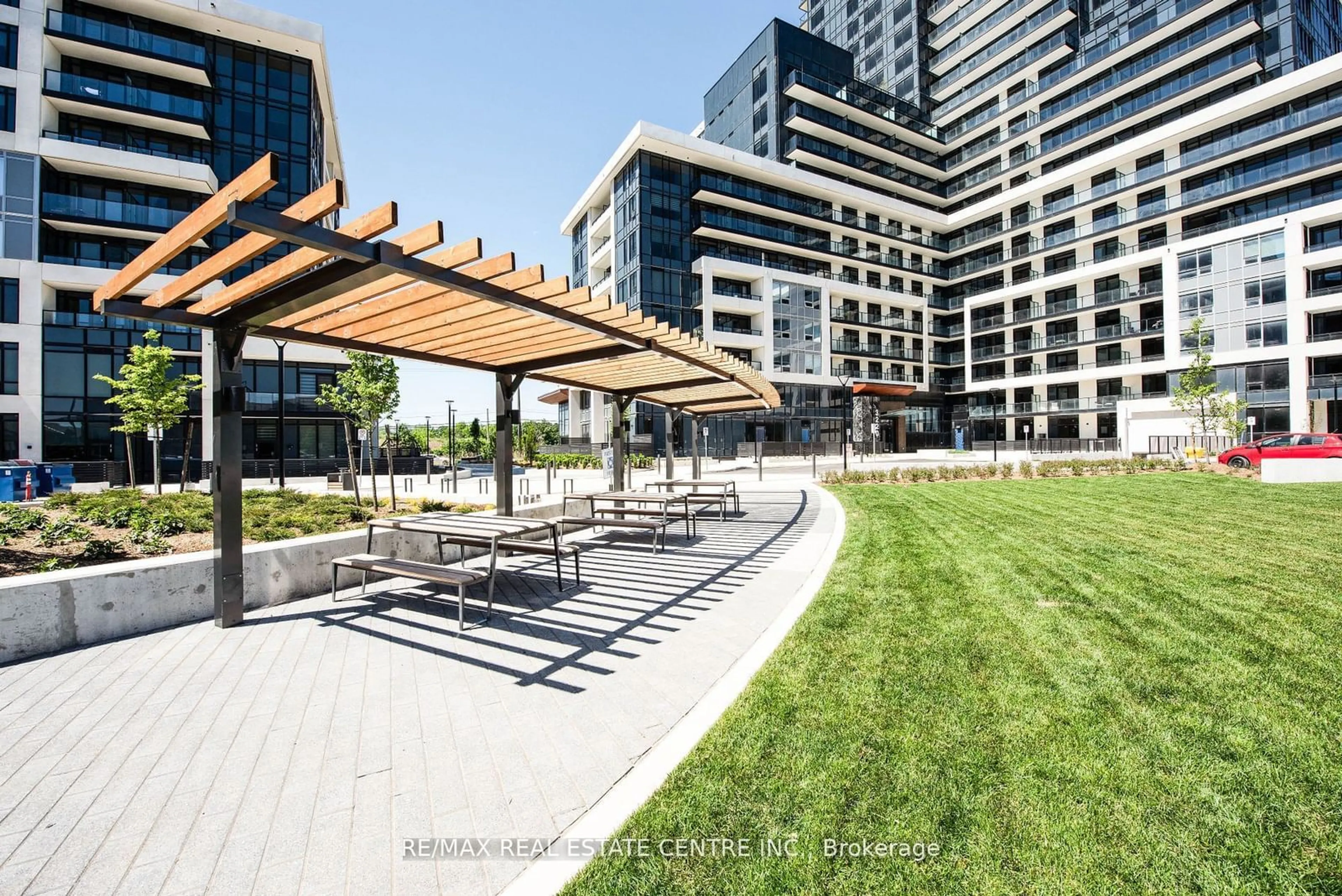 Patio, the view of city buildings for 3220 William Coltson Ave #1112, Oakville Ontario L6H 7X9