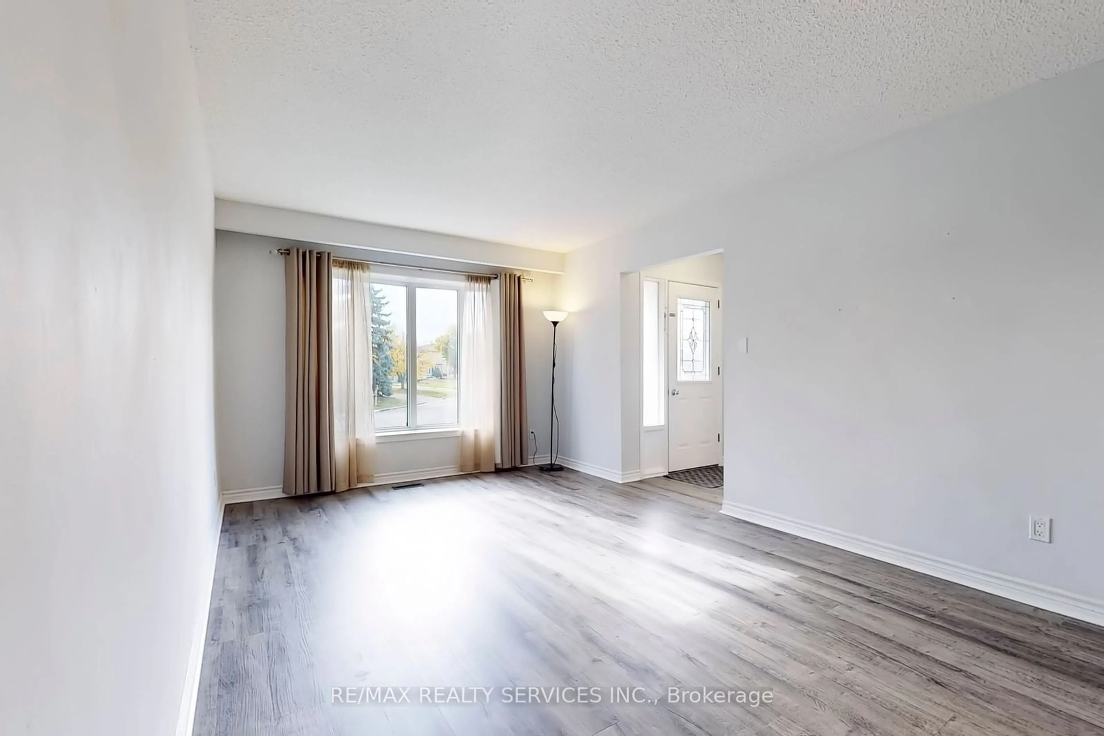 A pic of a room, wood floors for 55 Greenwood Cres, Brampton Ontario L6S 1T2