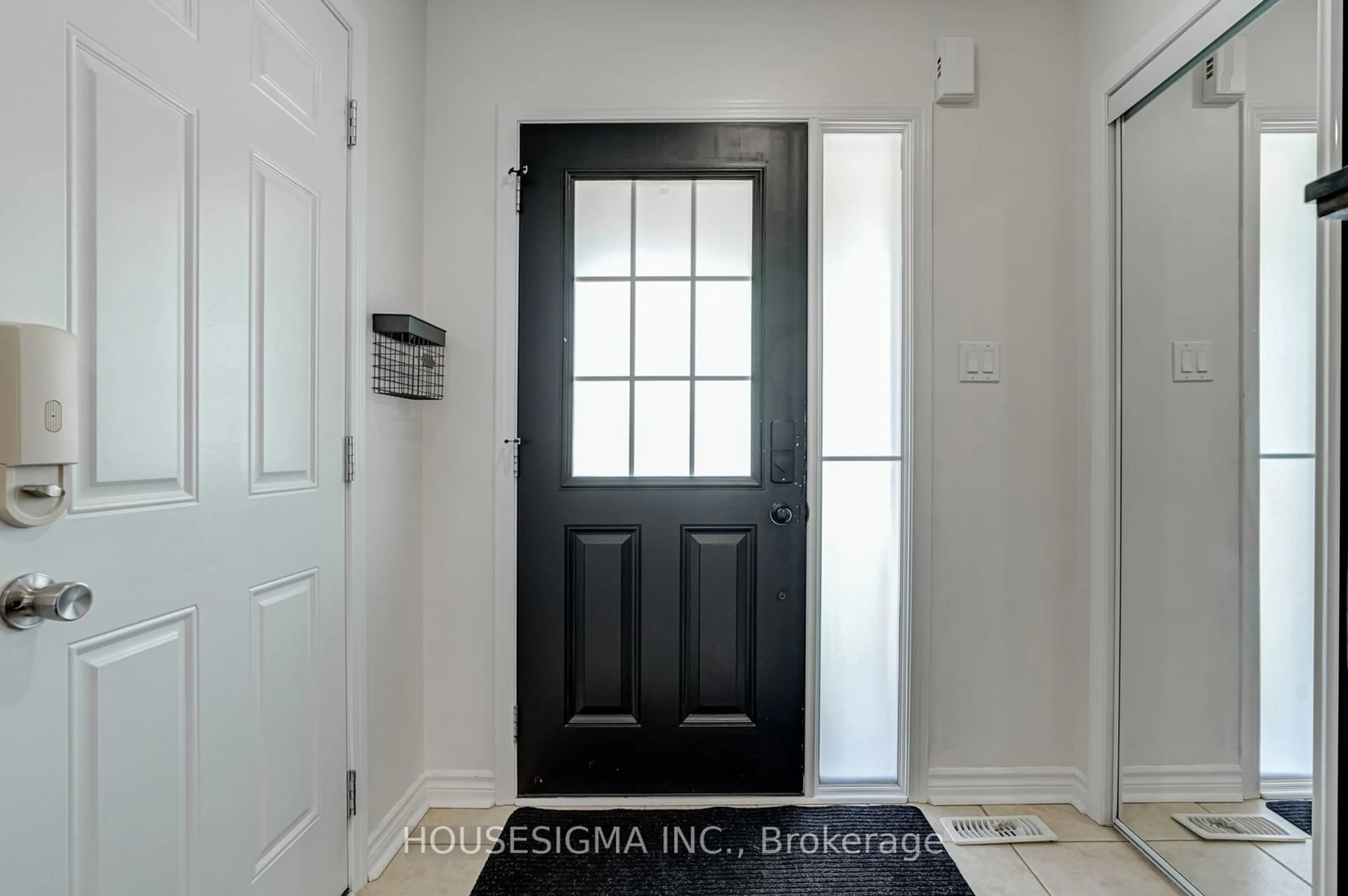 Indoor entryway, wood floors for 916 Rigo Crossing, Milton Ontario L9T 8E1