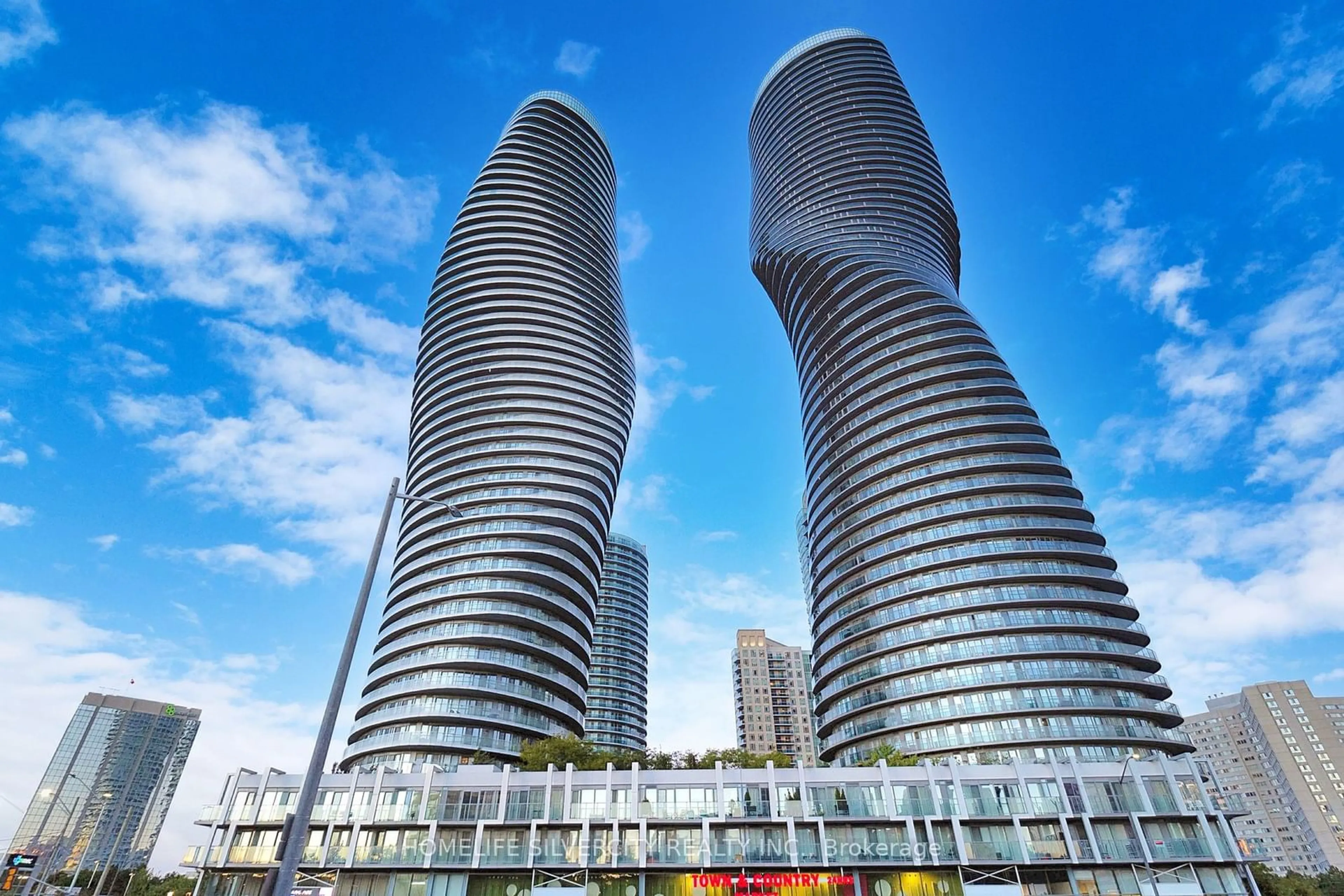 A pic from exterior of the house or condo, the view of city buildings for 50 Absolute Ave #3902, Mississauga Ontario L4Z 0A8