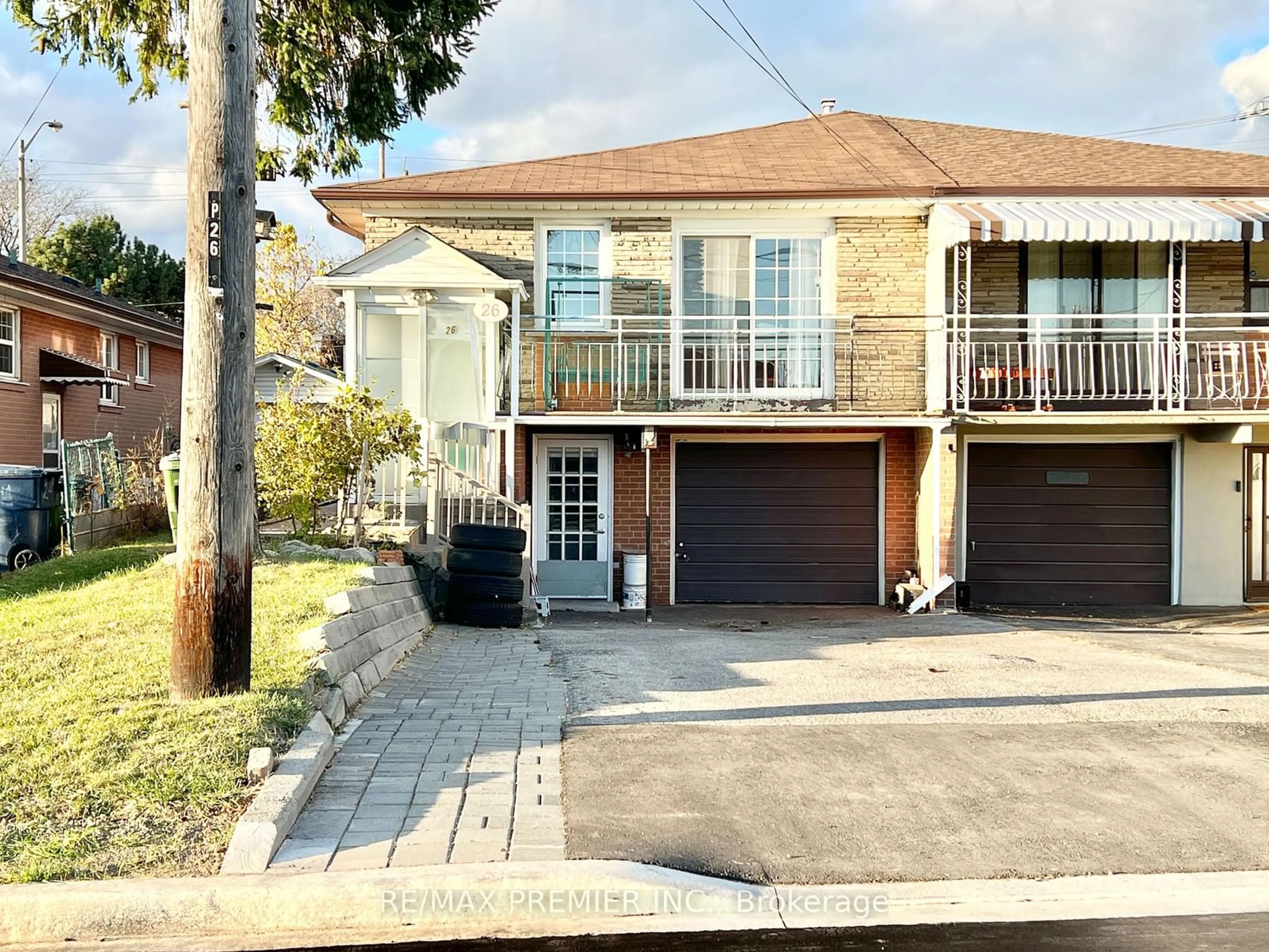 Frontside or backside of a home, the street view for 26 Thurrock Rd, Toronto Ontario M3L 1P6