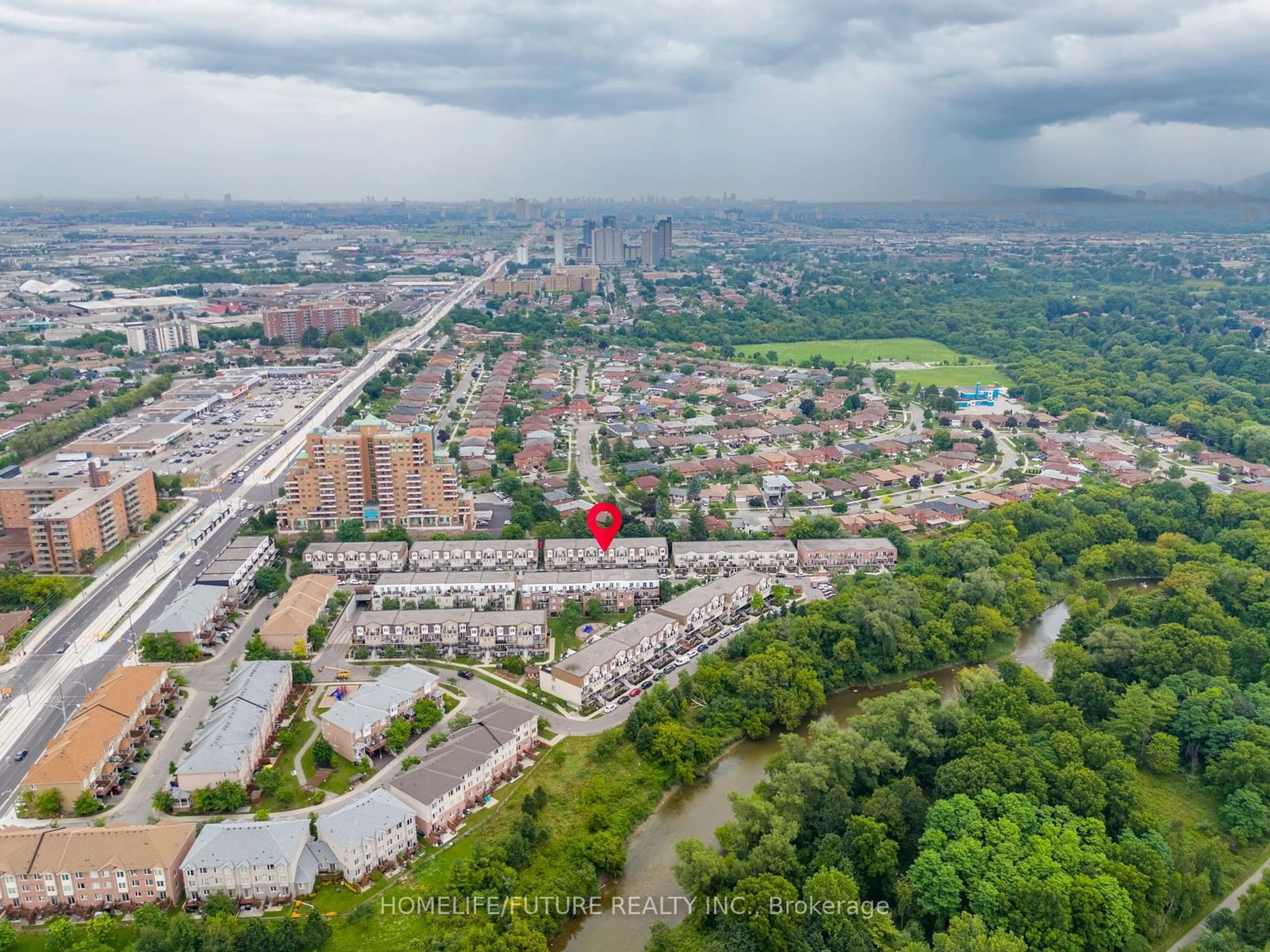 A pic from exterior of the house or condo, the view of city buildings for 3041 Finch Ave #2057, Toronto Ontario M9M 0A4