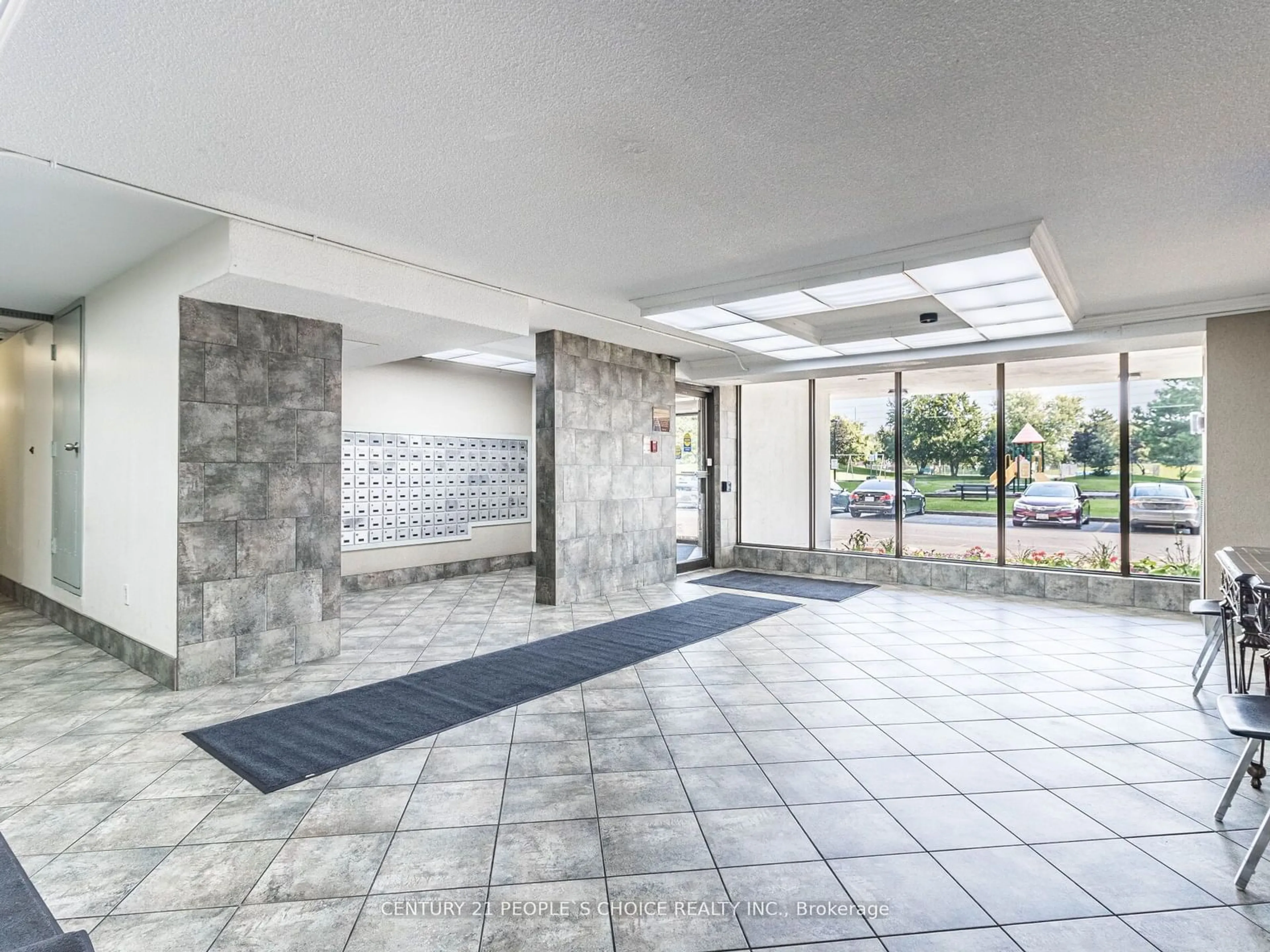 Indoor lobby, cement floor for 17 Knightsbridge Rd #308, Brampton Ontario L6T 3X9