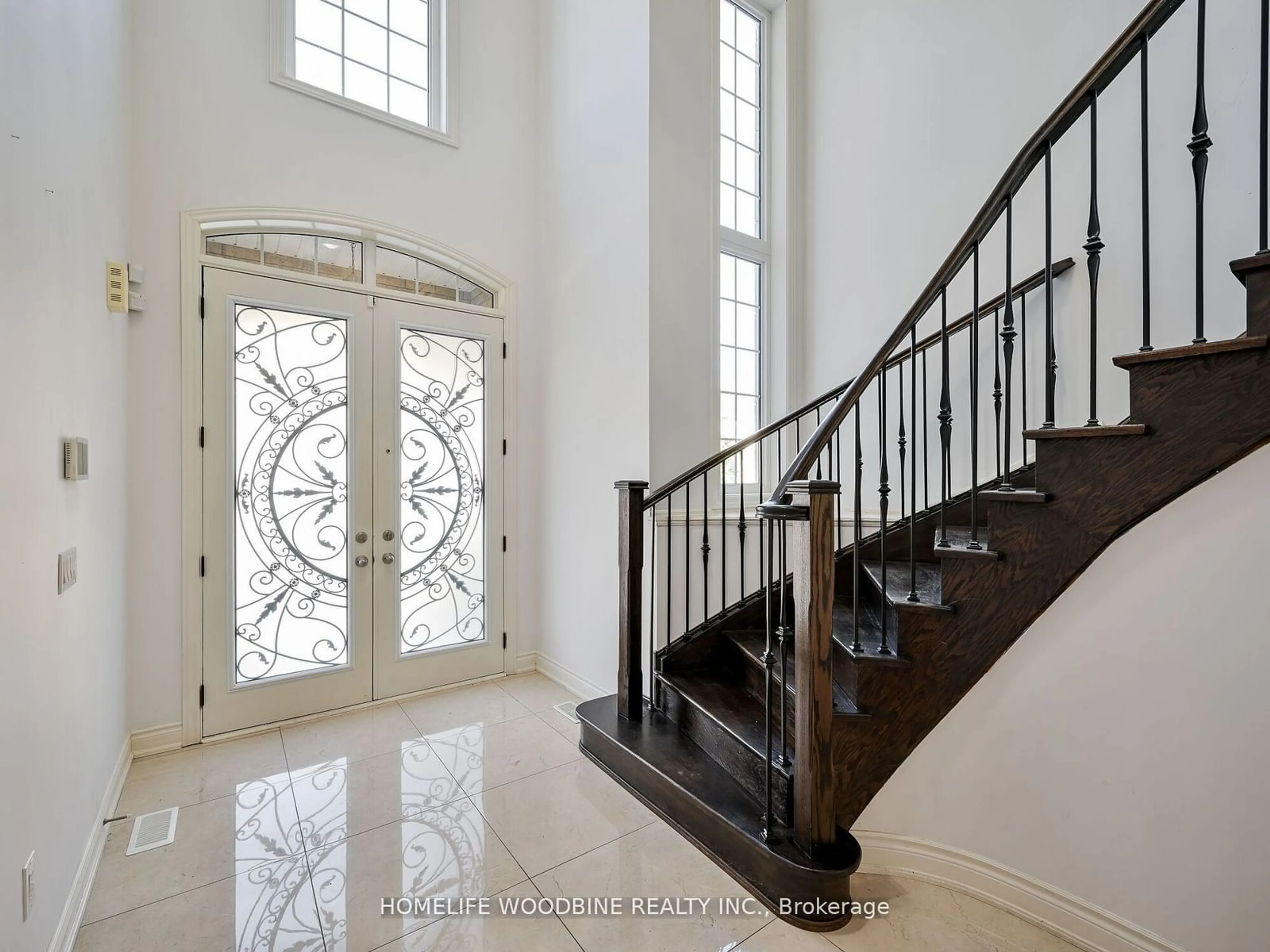 Indoor foyer, wood floors for 23 Gambia Rd, Brampton Ontario L7A 4M2