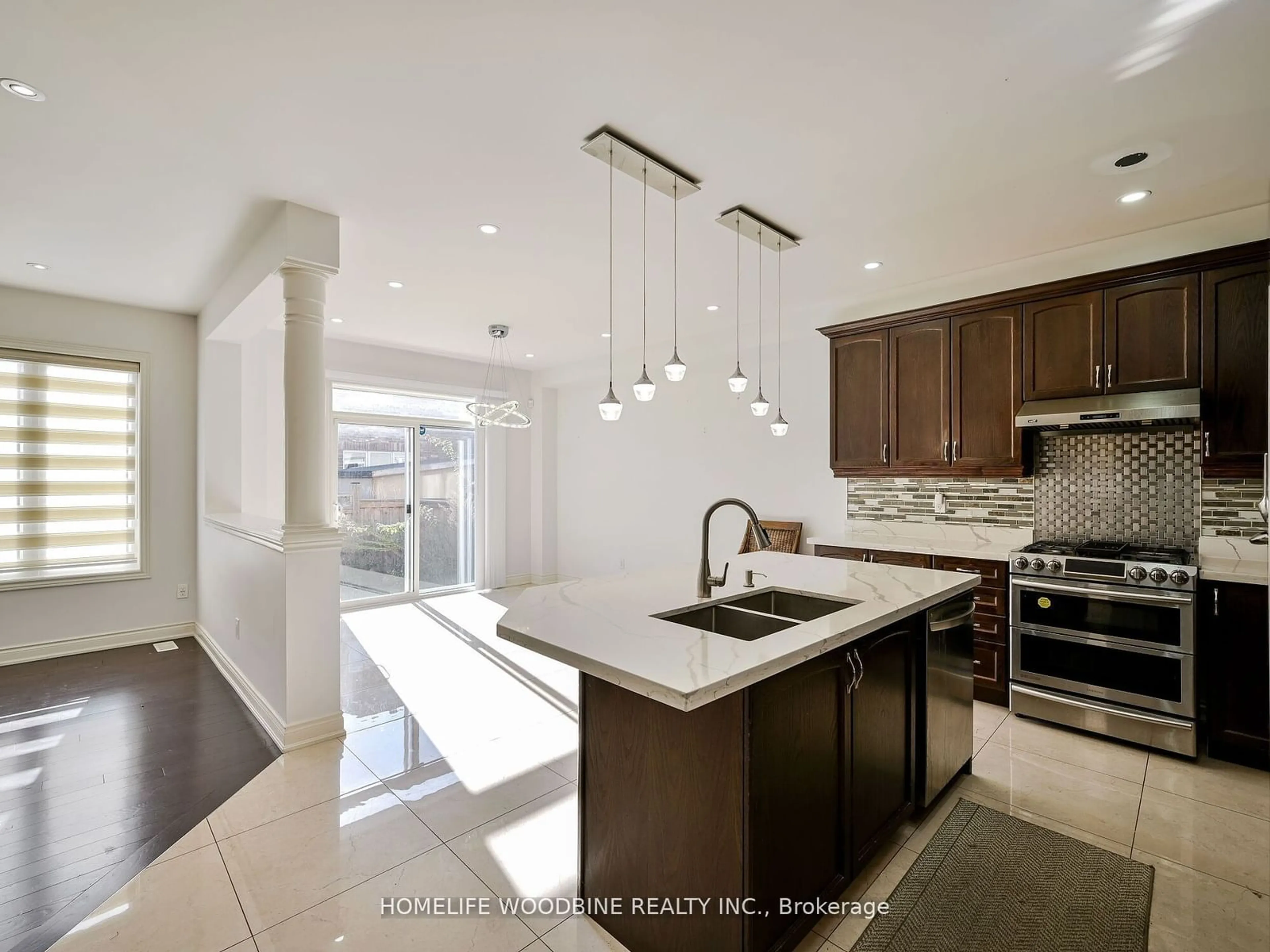 Open concept kitchen for 23 Gambia Rd, Brampton Ontario L7A 4M2