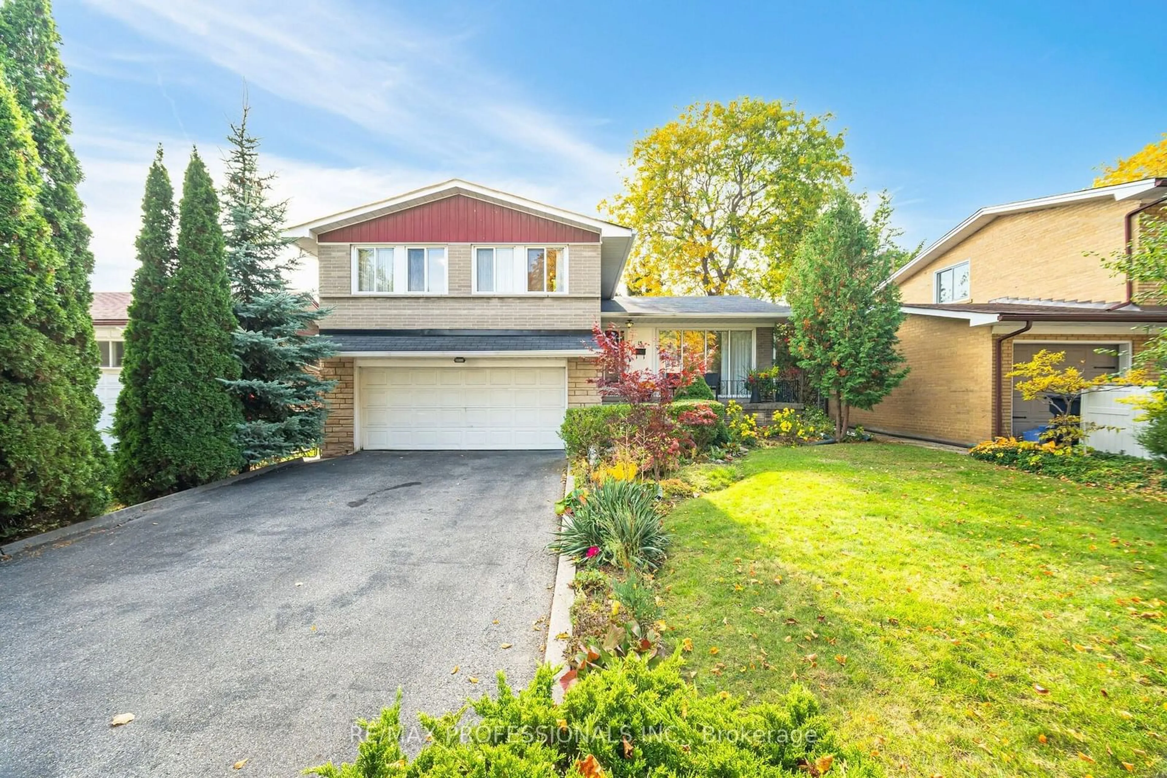 Frontside or backside of a home, the fenced backyard for 15 Hamptonbrook Dr, Toronto Ontario M9P 1A2