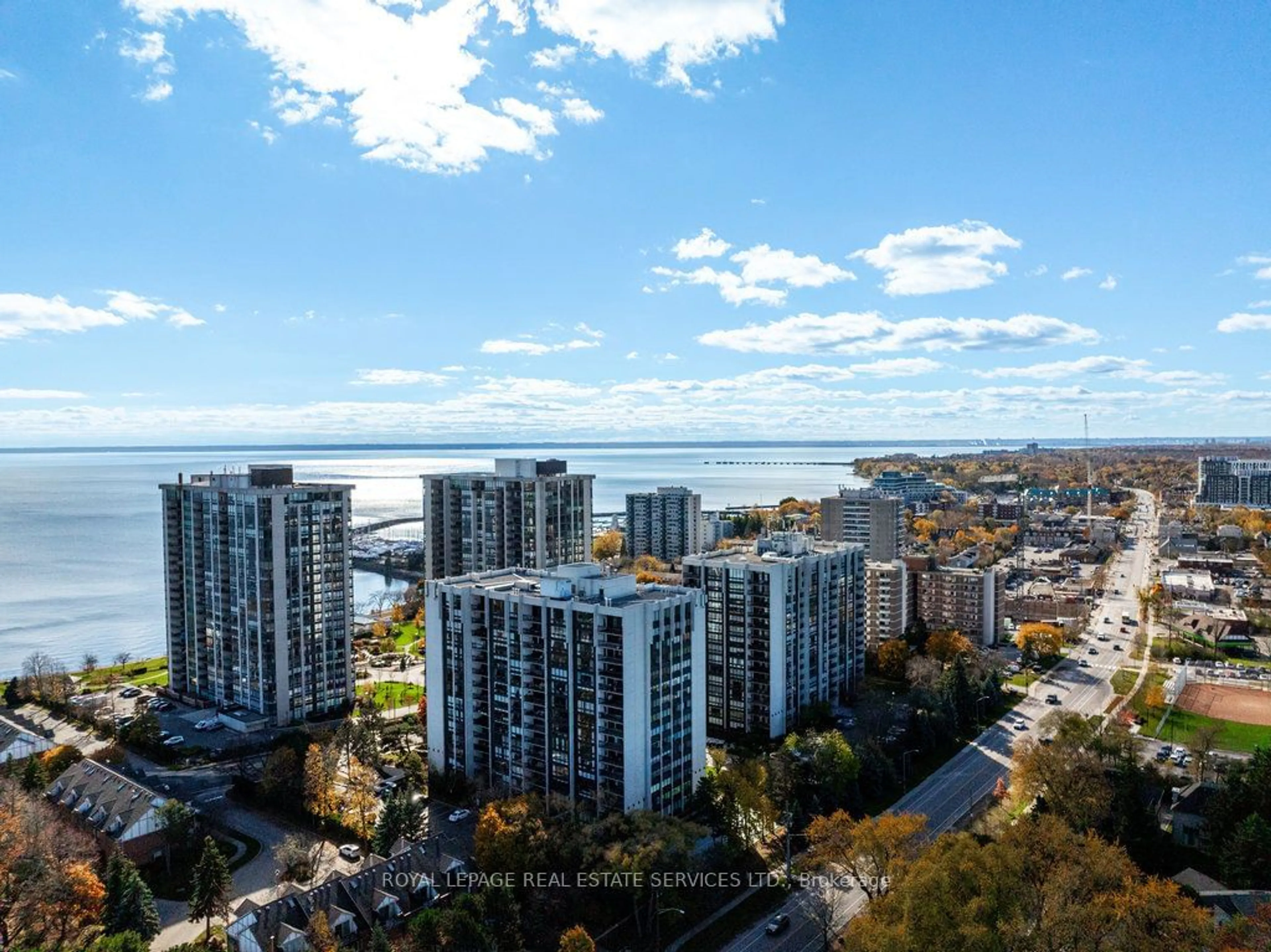 A pic from exterior of the house or condo, the view of city buildings for 2175 Marine Dr #301, Oakville Ontario L6L 5L5