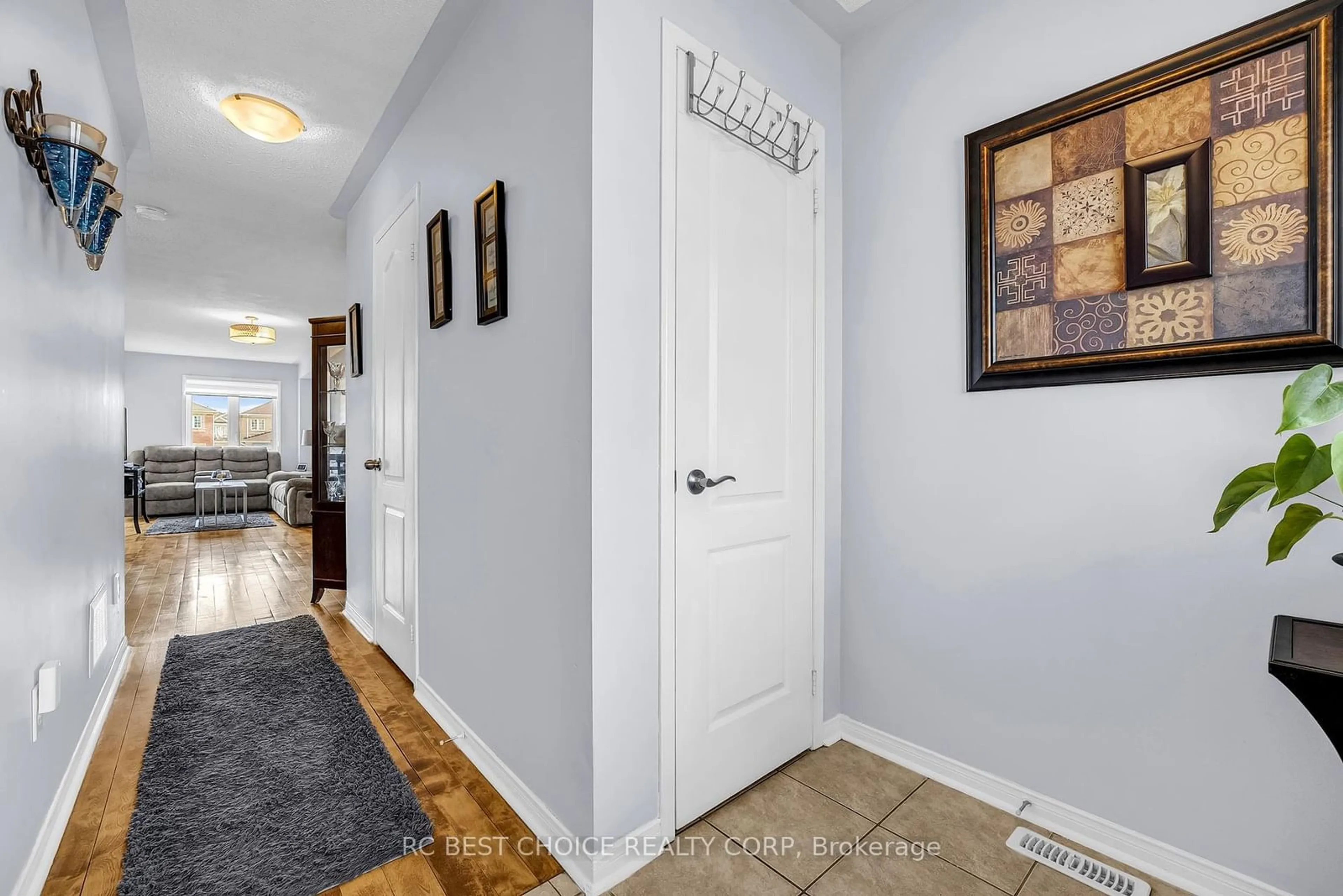 Indoor entryway, wood floors for 69 Roundstone Dr, Brampton Ontario L6X 0K4