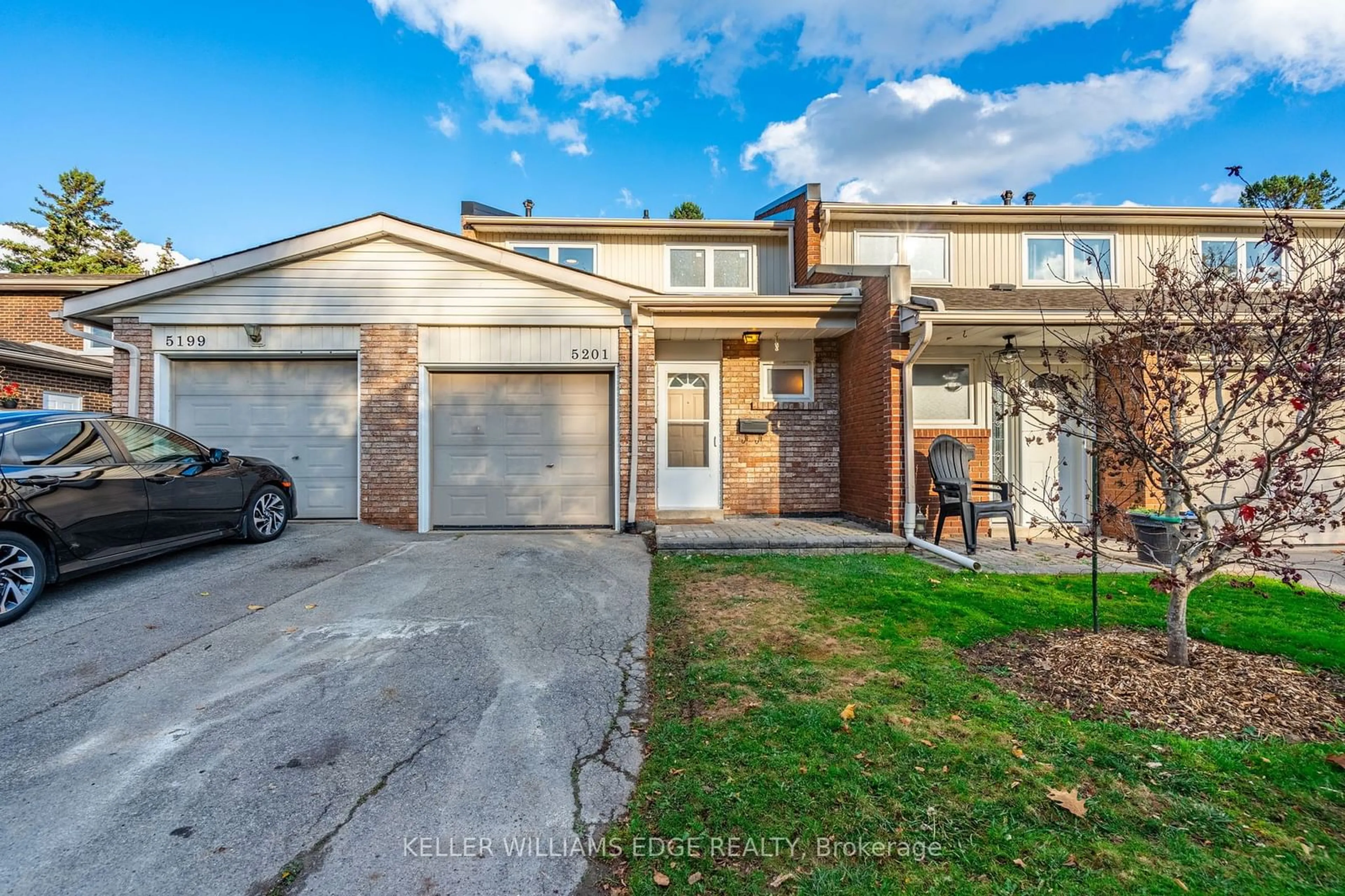 A pic from exterior of the house or condo, the fenced backyard for 5201 Banting Crt, Burlington Ontario L7L 2Z4