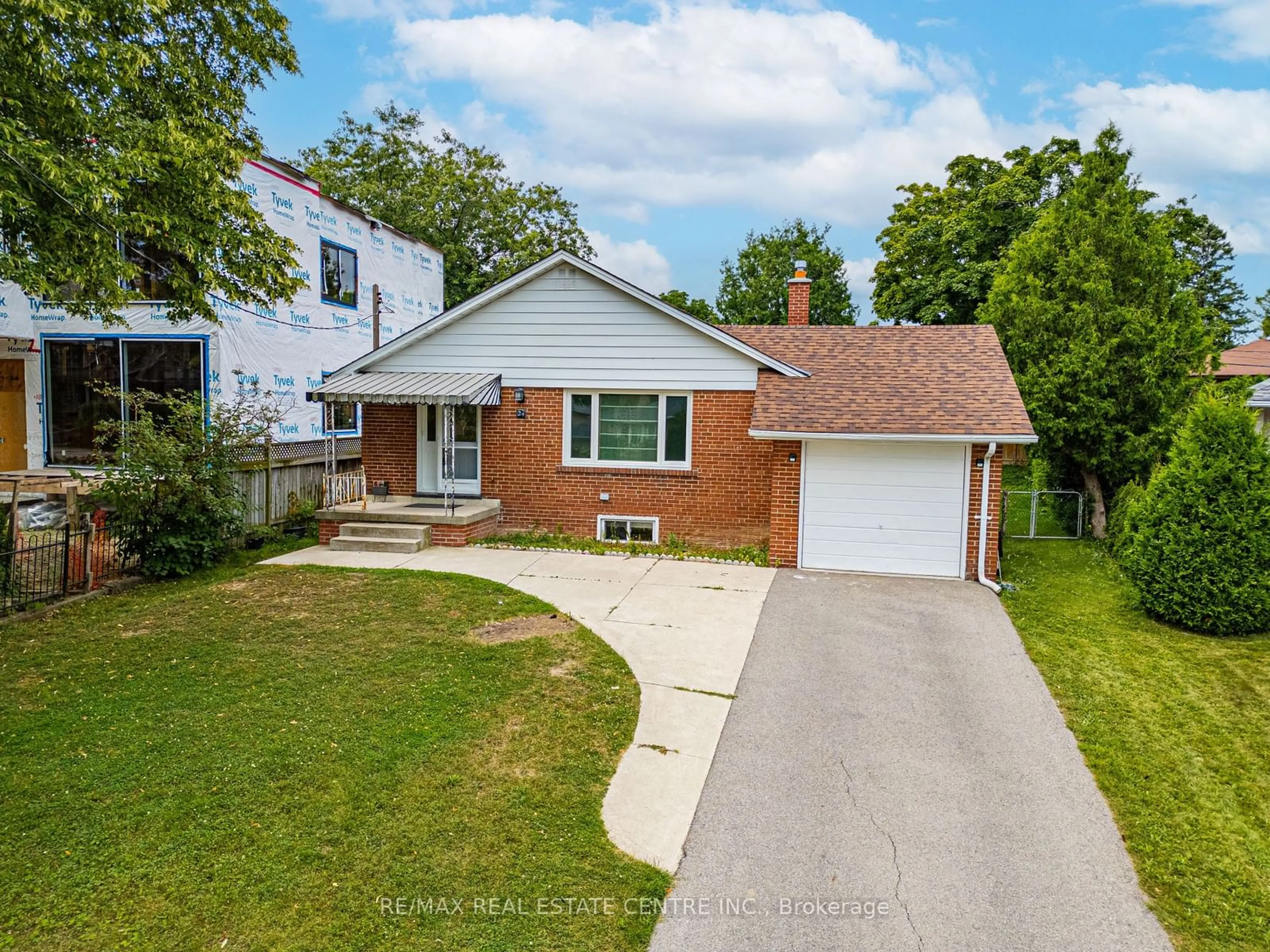 Frontside or backside of a home, the street view for 24 Duncairn Dr, Toronto Ontario M9B 2P1