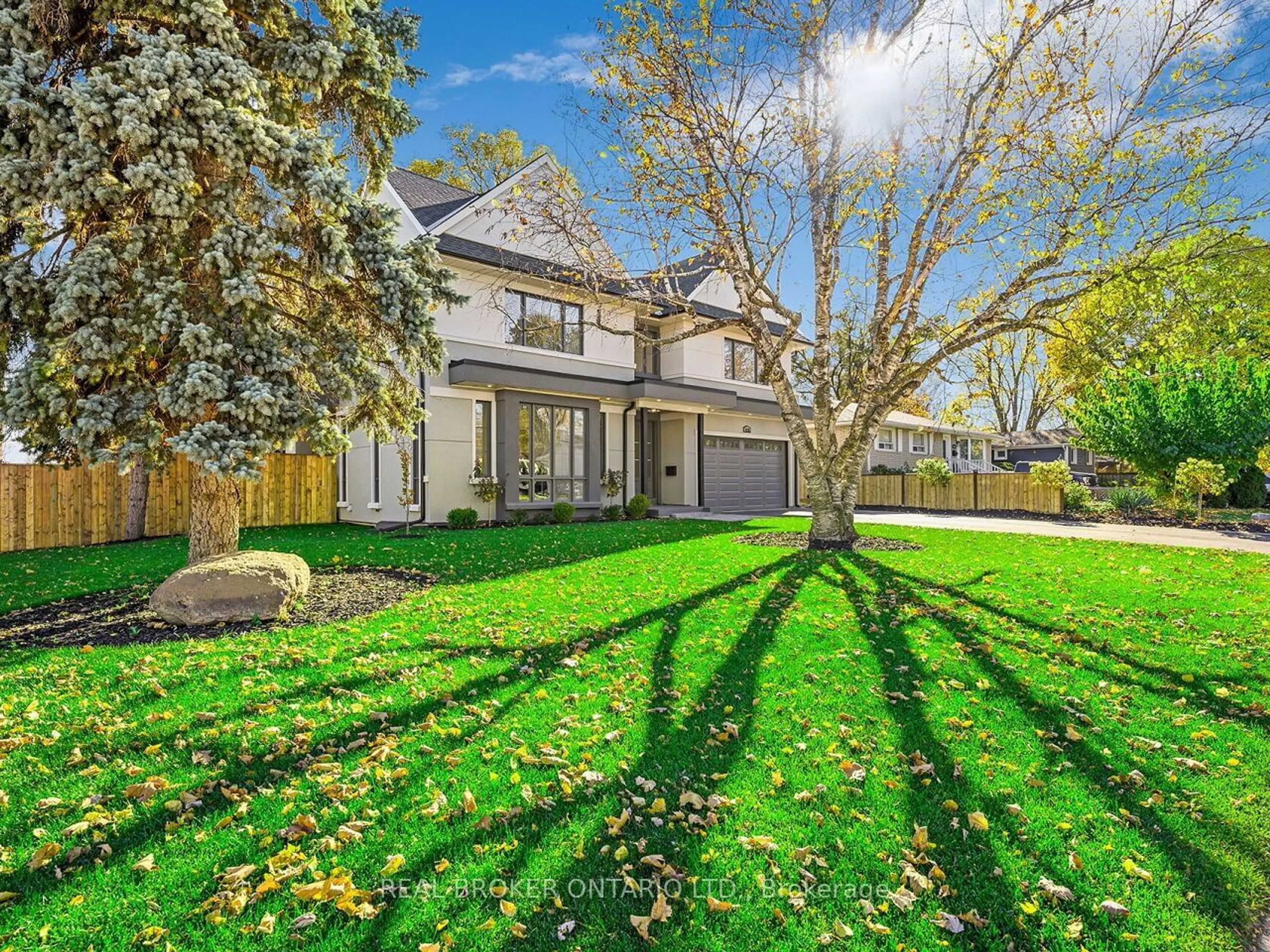 A pic from exterior of the house or condo, the fenced backyard for 5538 Eaton Ave, Burlington Ontario L7L 4W6