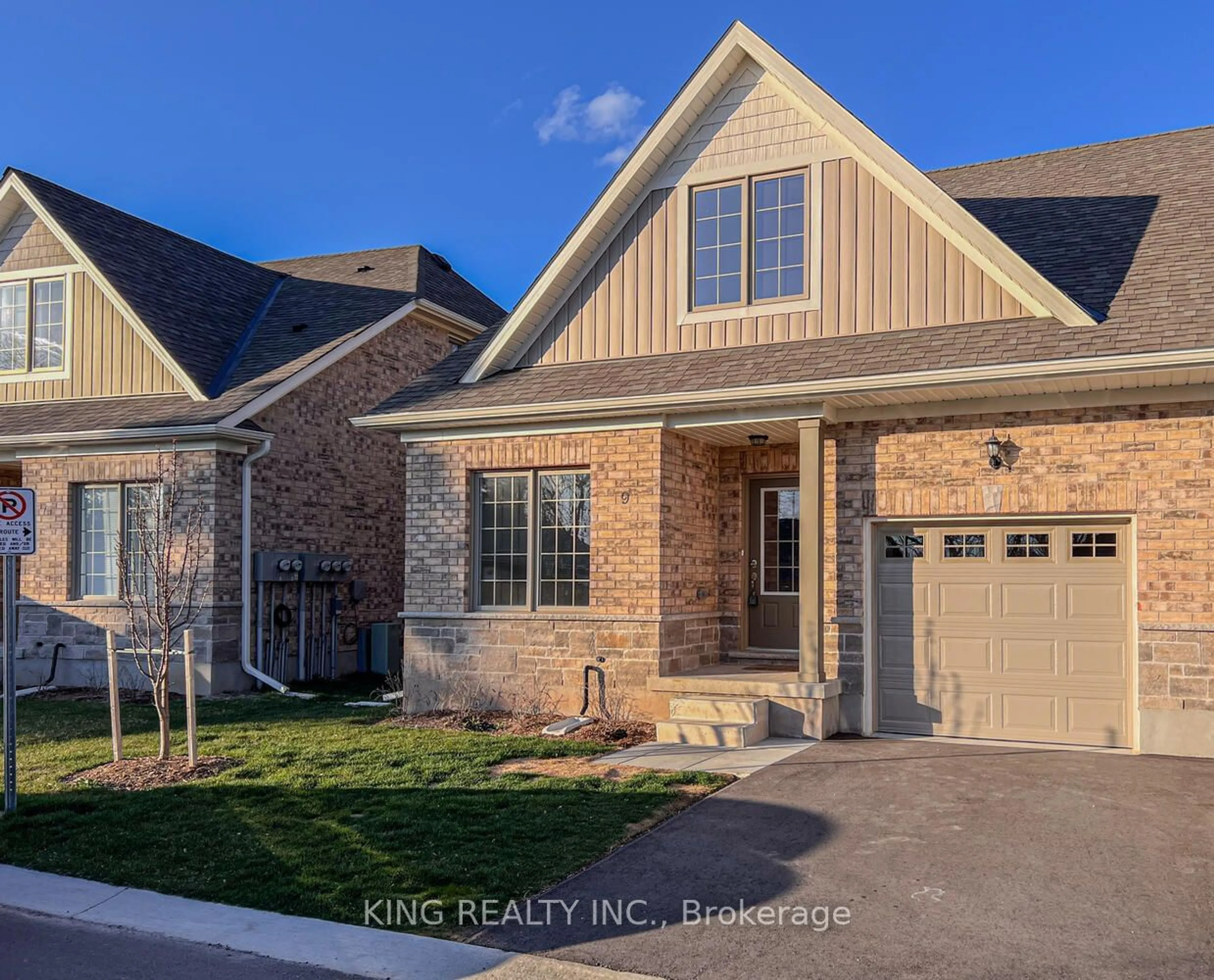 Home with brick exterior material for 9 Braida Lane #5, Halton Hills Ontario L7J 1P9