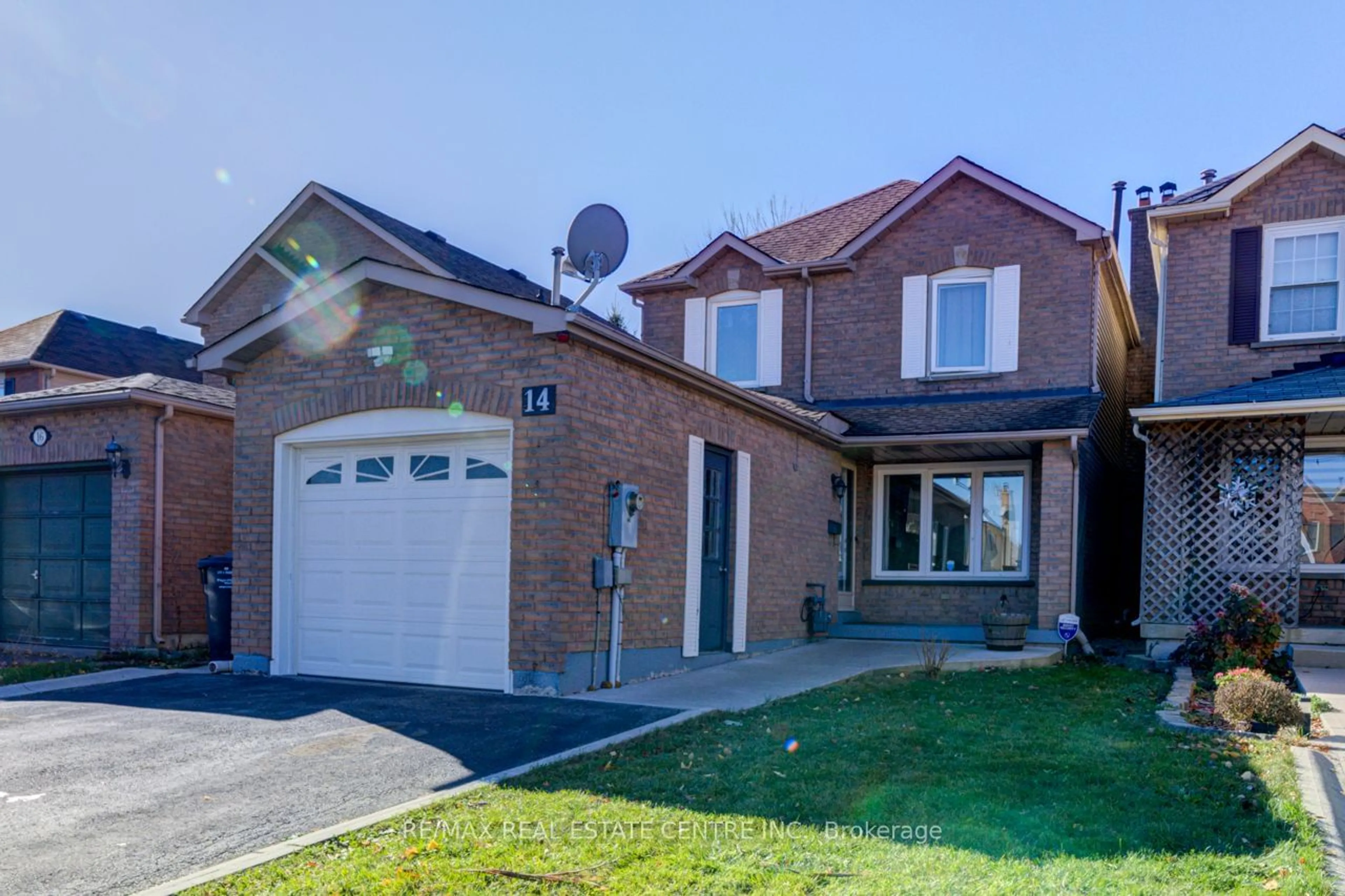 Frontside or backside of a home, the street view for 14 Solway Ave, Brampton Ontario L6Z 4E3