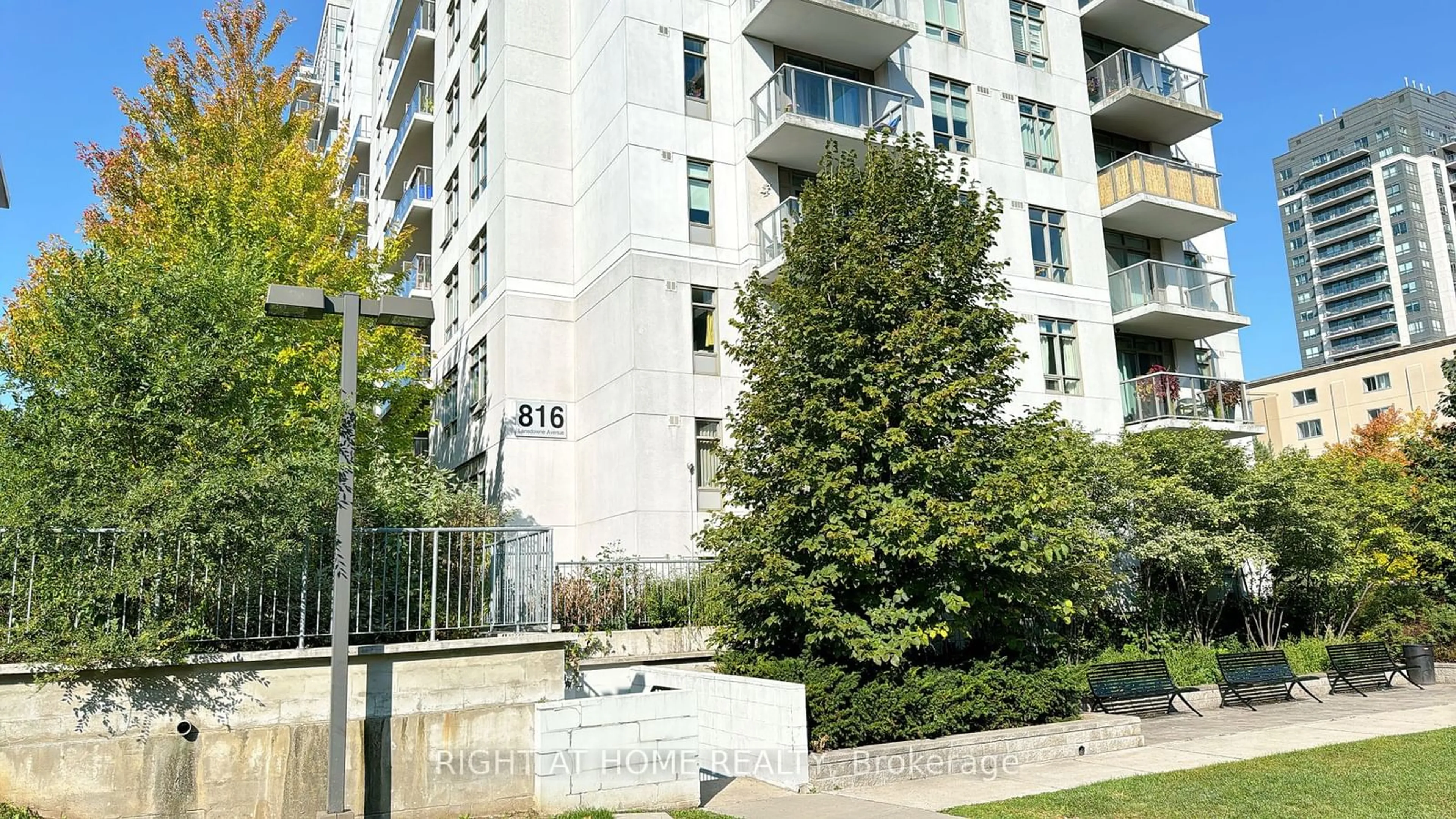 A pic from exterior of the house or condo, the front or back of building for 816 Lansdowne Ave #106, Toronto Ontario M6H 4K6