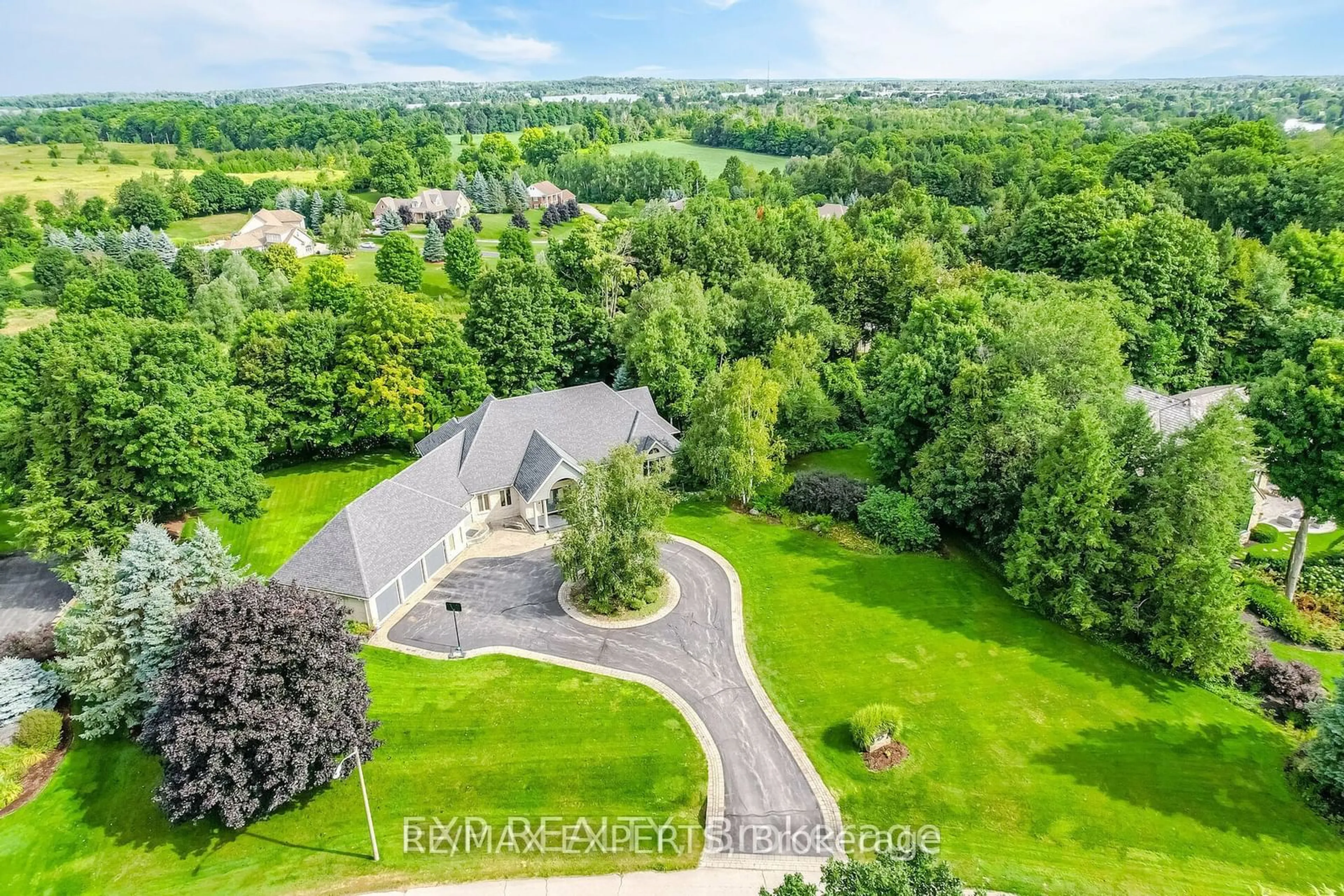 Frontside or backside of a home, the fenced backyard for 15 Turtle Lake Dr, Halton Hills Ontario L7J 2W7