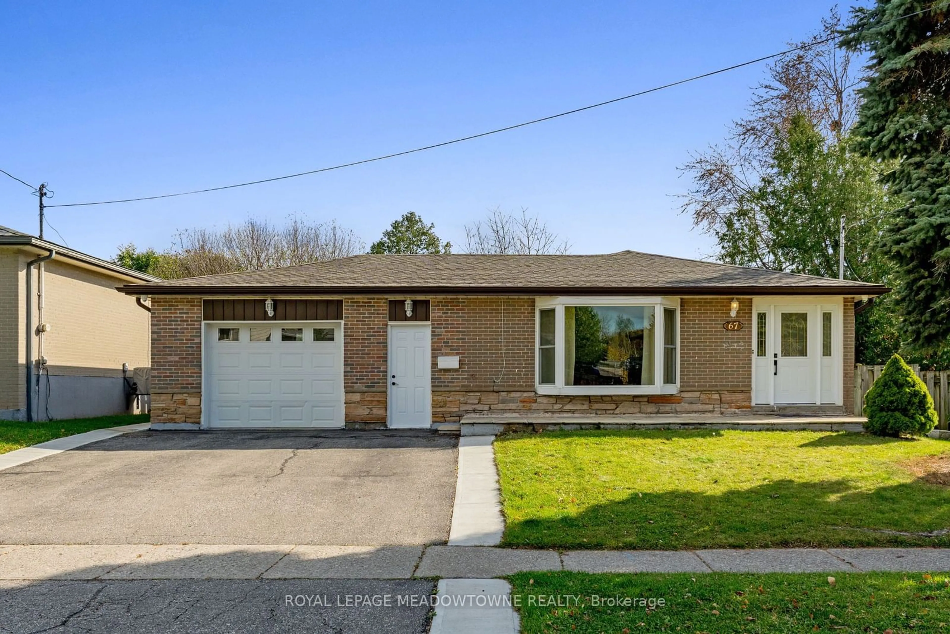 Frontside or backside of a home, cottage for 67 ELEANOR Cres, Halton Hills Ontario L7G 2T7