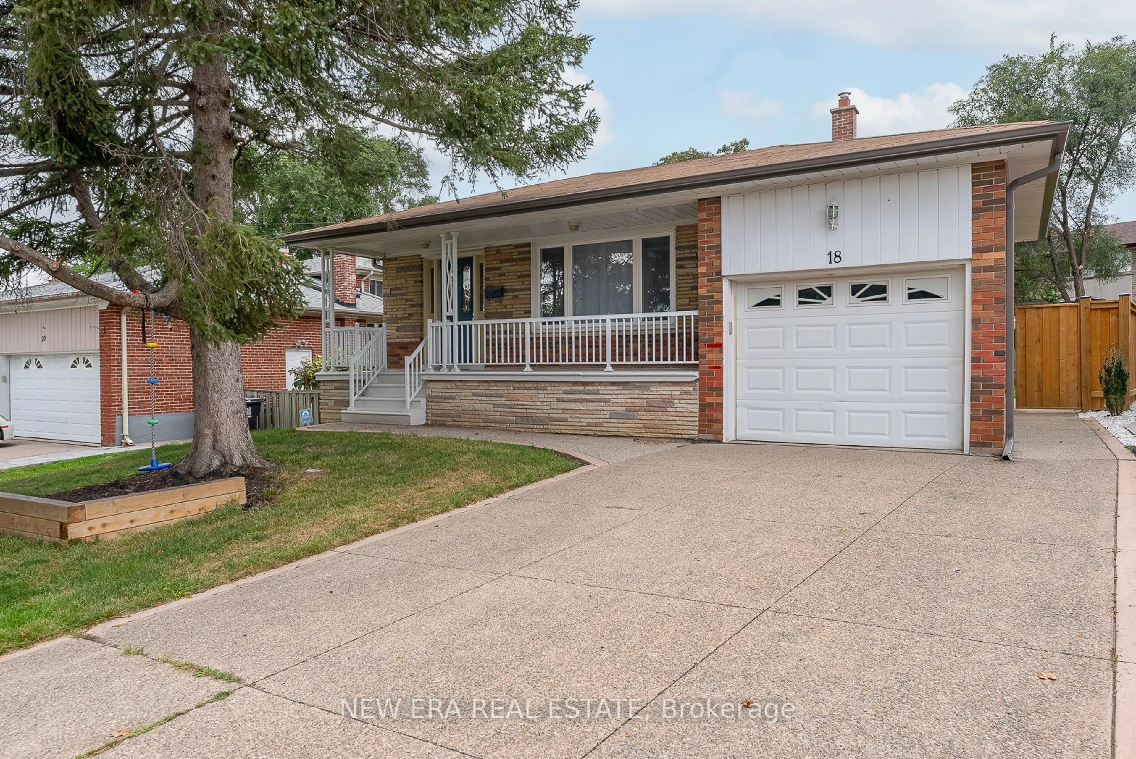 Frontside or backside of a home, the street view for 18 West Wareside Rd, Toronto Ontario M9C 3J1