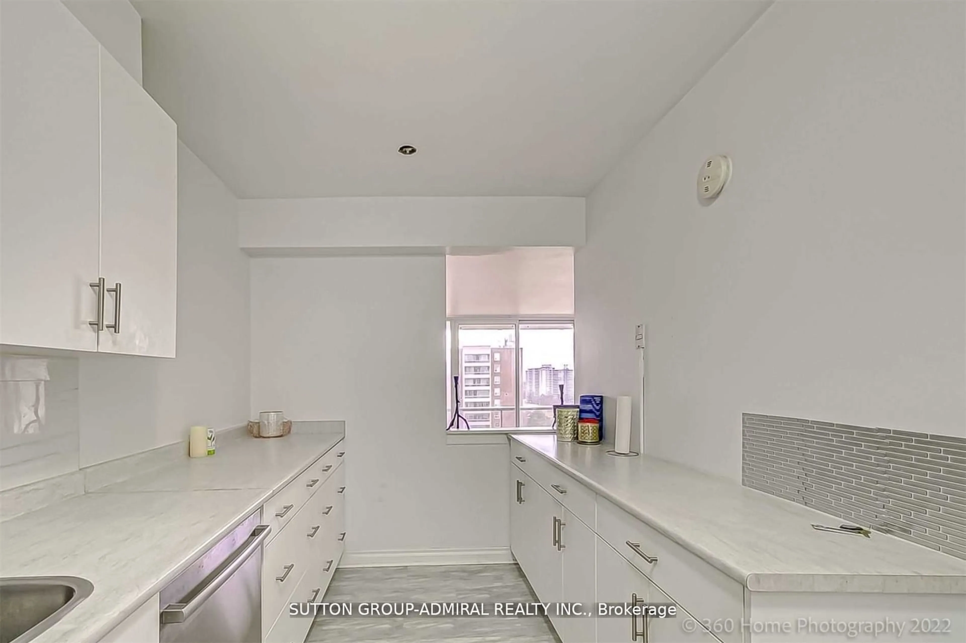 Standard kitchen, ceramic floors, the street view for 25 Four Winds Dr #902, Toronto Ontario M3J 1K8