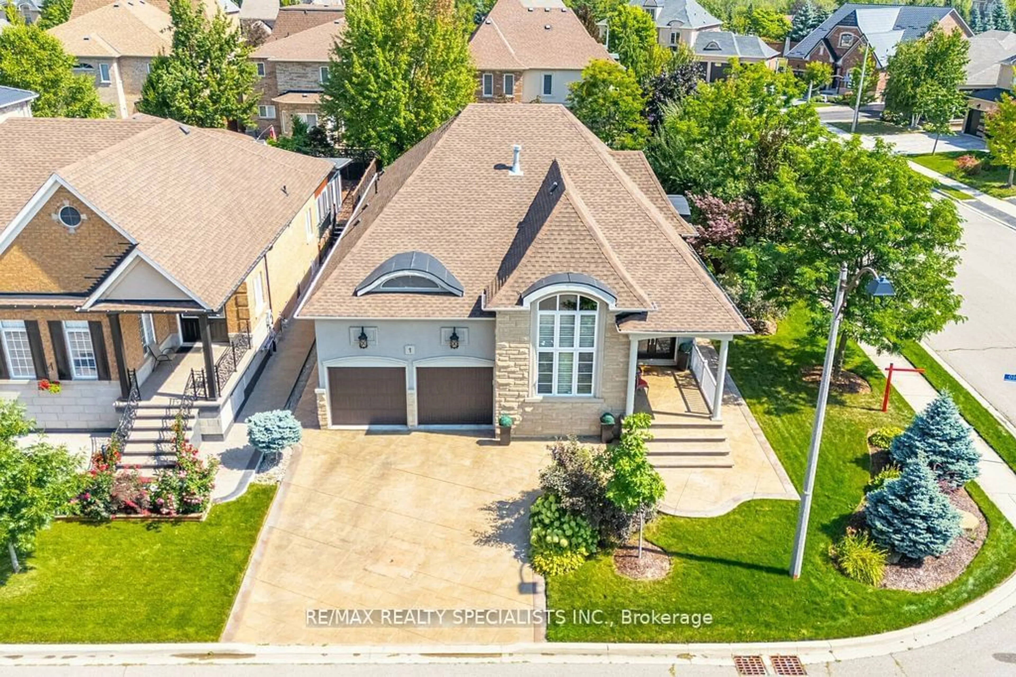 Frontside or backside of a home, the street view for 1 Odeon St, Brampton Ontario L6P 1X5